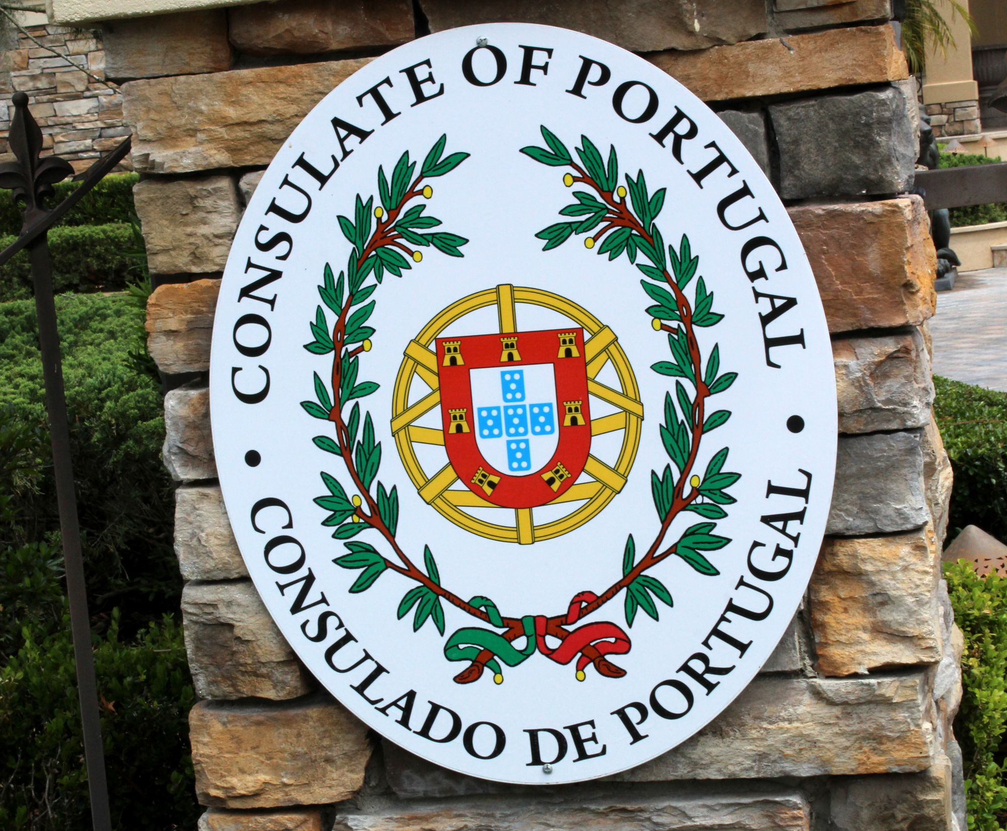 The seal of Portugal adorns the entrance to the consul's home in Plantation Bay. Photo by Jacque Estes