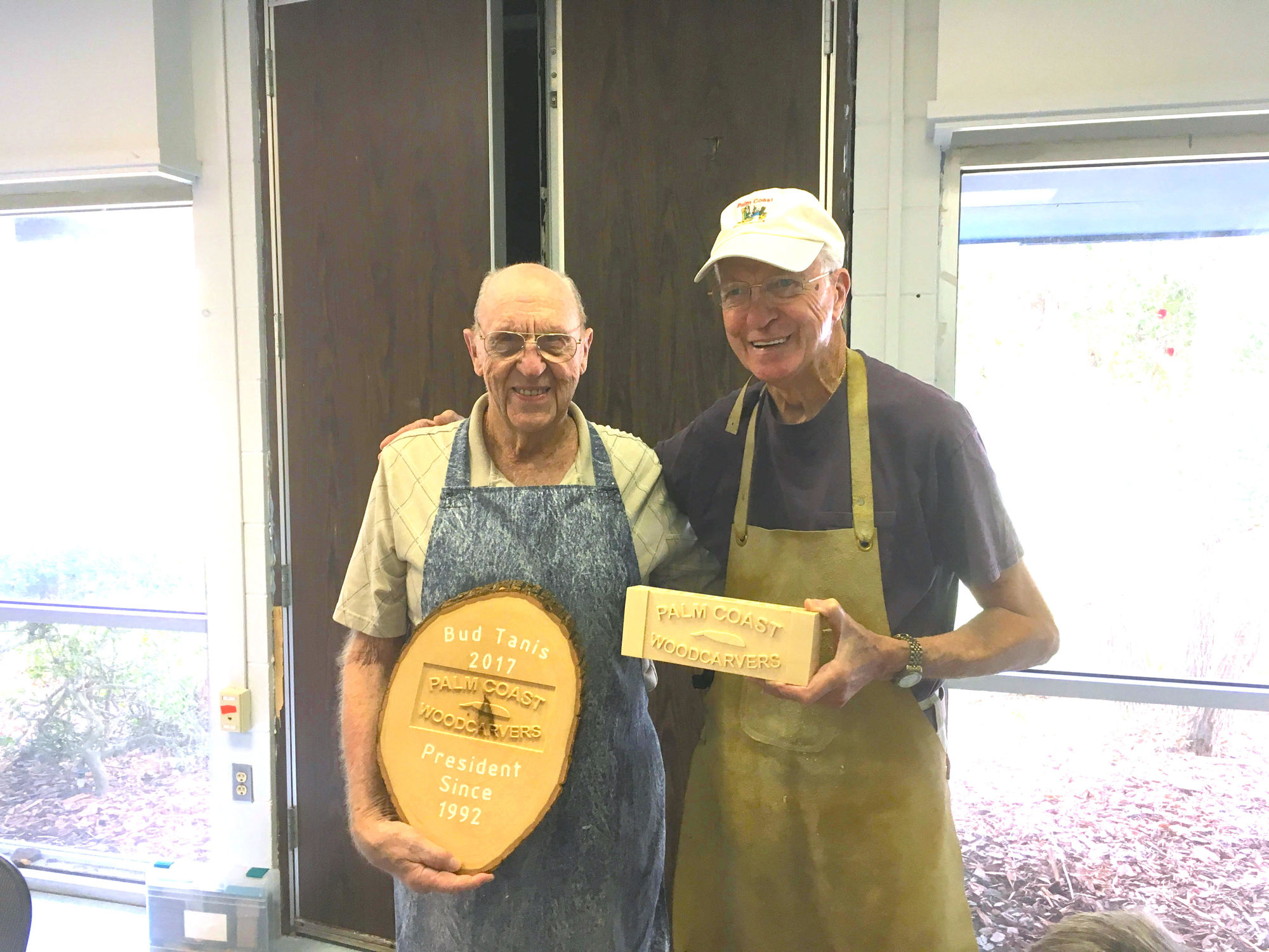 Former Woodcarvers President Bud Tanis, with new President Howard Hawrey. Call Hawrey at 503-9542.