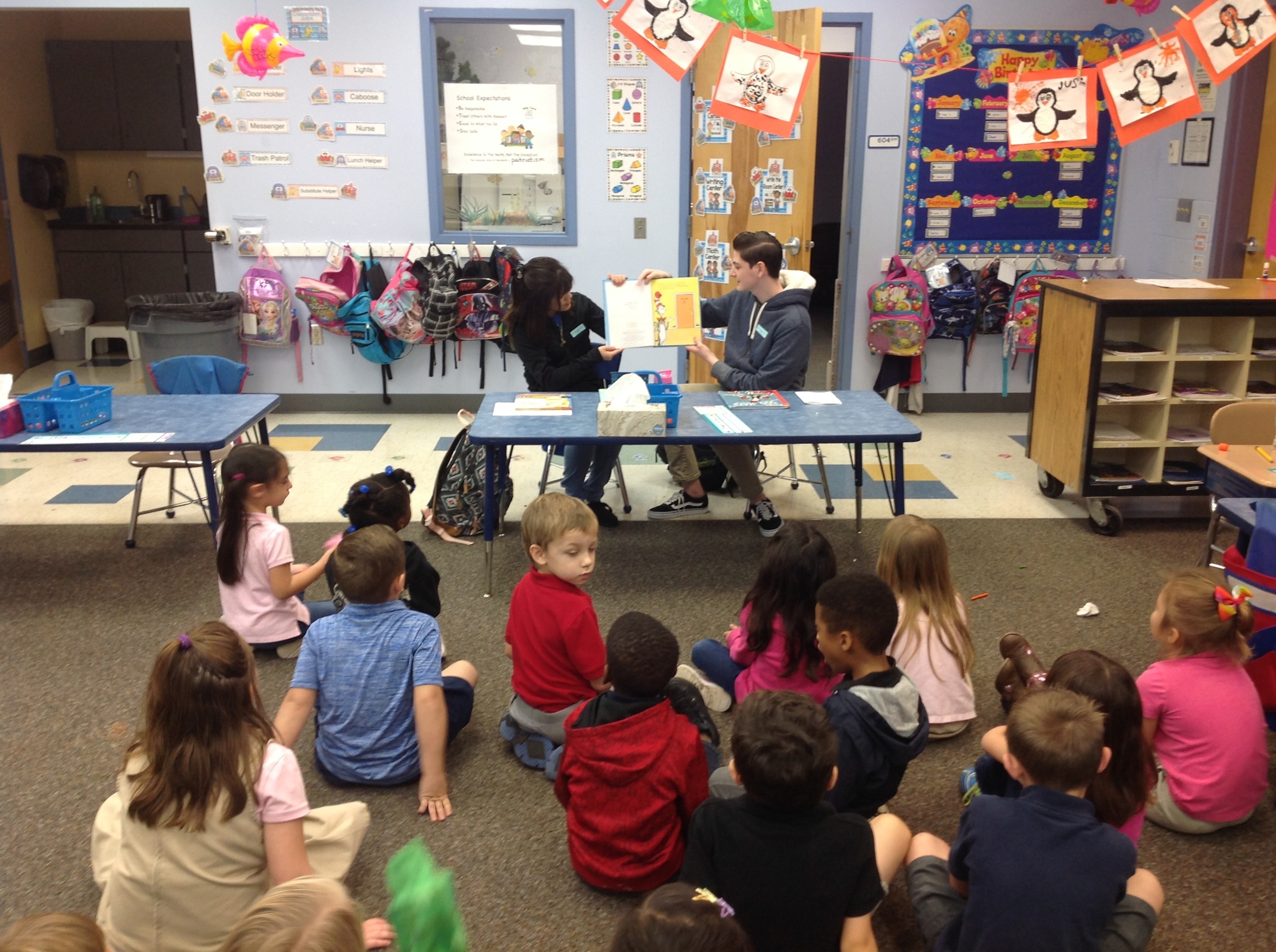 Matanzas High School students Susie Rodriguez and Caleb Krassner read to a class at Belle Terre Elementary. Photo courtesy of Catherine Brandner