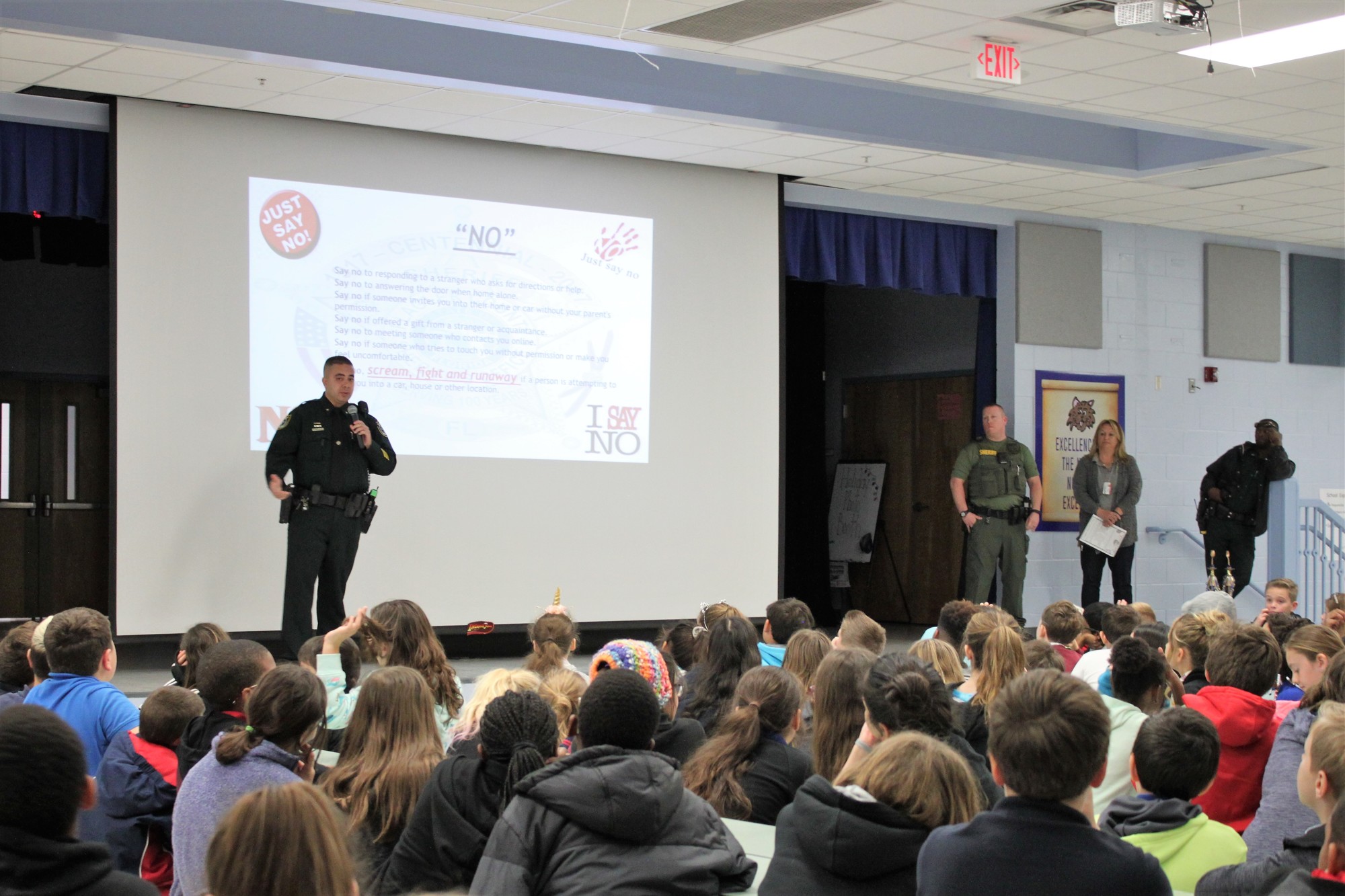 FCSO Cpl. Phil Reynolds, Sgt. Jon Welker, PAL Coordinator Kerri Henderson and Deputy Sam Cooper present safety tips to Belle Terre Elementary School students. Photo courtesy of Shannon Martin