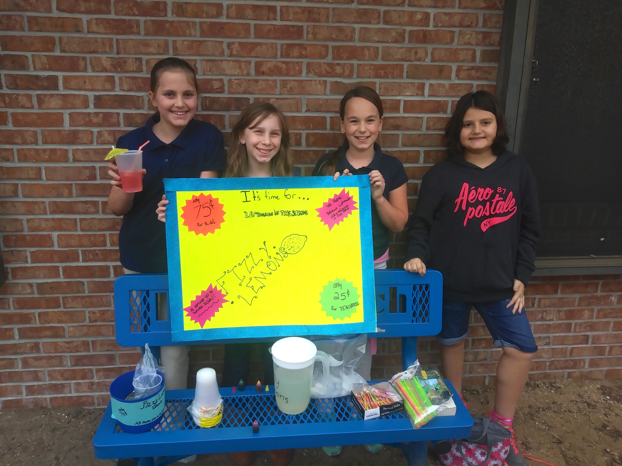 Wadsworth Elementary students Carolyn O'Lear, Jenna Tejeda, Elie Hull and Victoria Dasilva raise money during a 