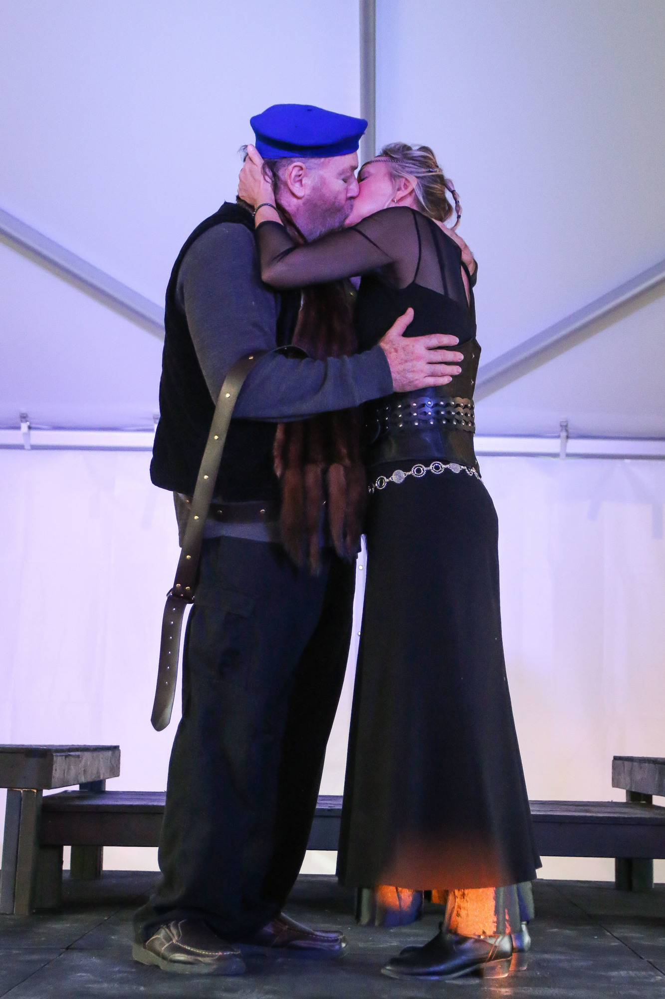 Robert O. Dimsey and Sharon Resnikoff share a passionate kiss on stage as Macbeth and Lady Macbeth. Photo by Paige Wilson
