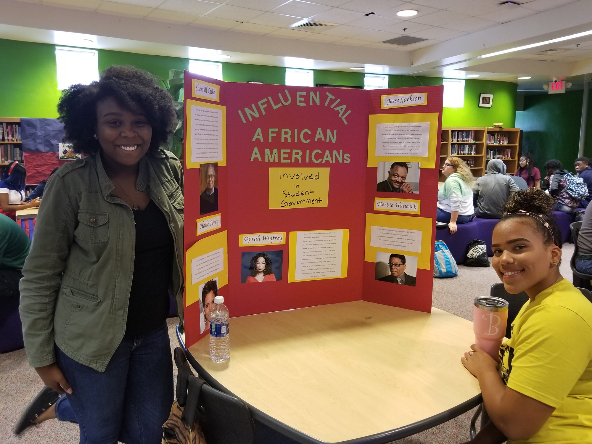 SGA members Emani Desinor and Braylynn McCall in front of their station about African American Leaders that were a part of their schools’ Student Government Associations. Photo courtesy of Cheryl Perry