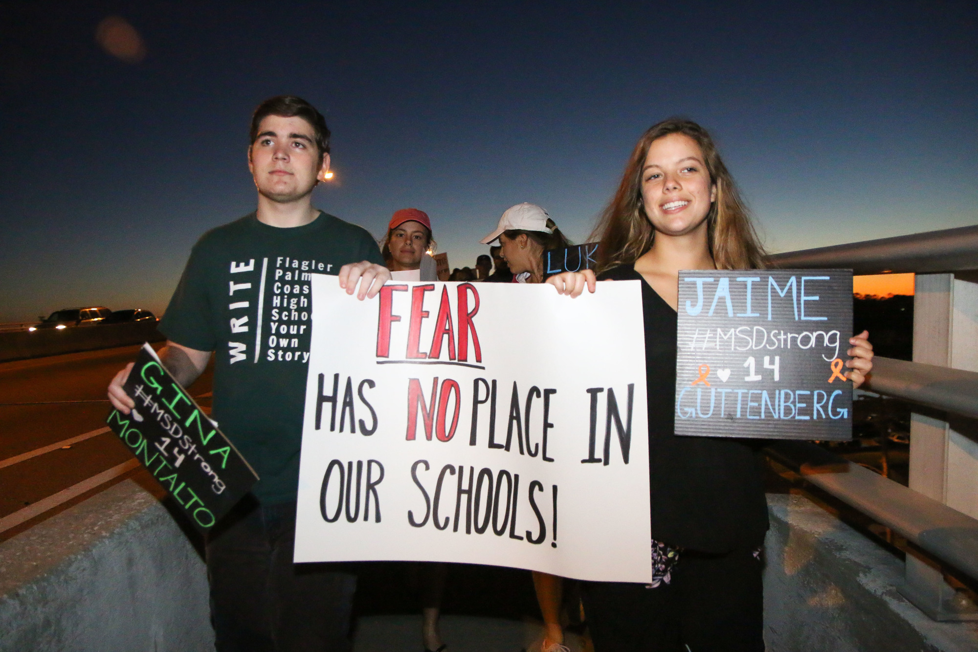 FPCHS SGA President Tyler Perry and SGA member Alyssa Santore lead the march over the bridge. Photo by Paige Wilson