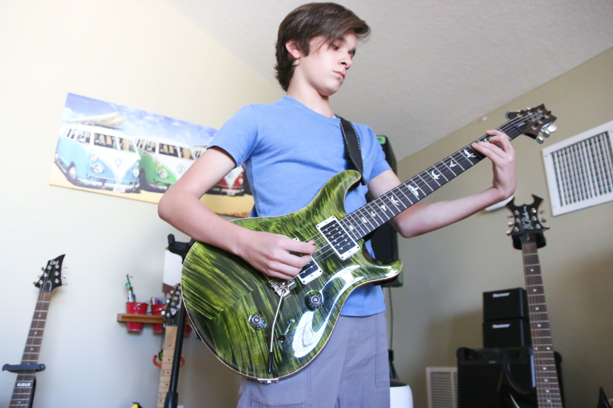 Logan Fingerhut plays his PRS guitar. Photo by Paige Wilson