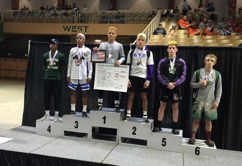 FPC's Avery Holder on the podium after his win. Photo courtesy of Flagler Palm Coast High School