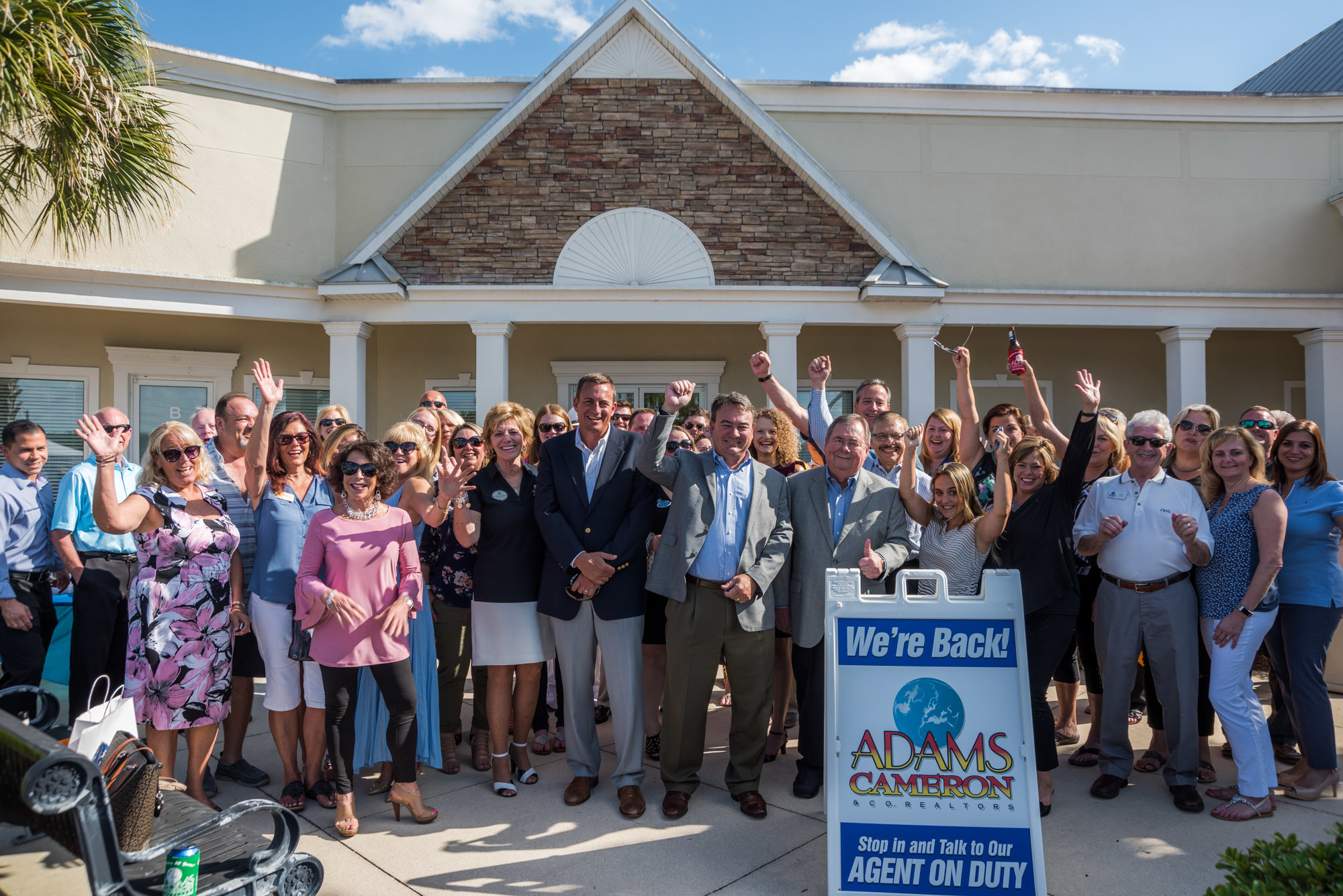 Adams, Cameron and Co., Realtors celebrated the opening of its Palm Coast office with a ribbon-cutting ceremony on April 25. Photo courtesy of Joy Davis