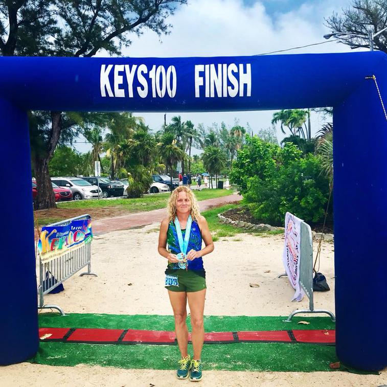 Dawn Lisenby poses after a 100-mile ultra race in the Keys in May 2018. She placed fourth in her age group. Courtesy photo