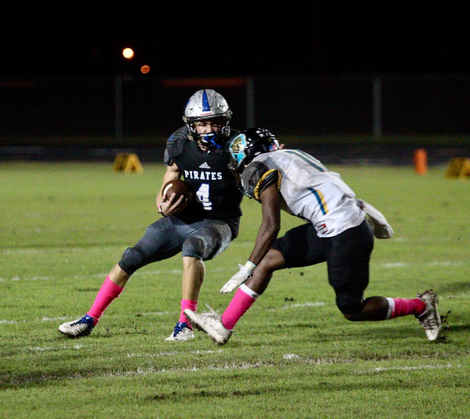 Matanzas' Josef Powell attempts to dodge a tackle against Pine Ridge. File photo