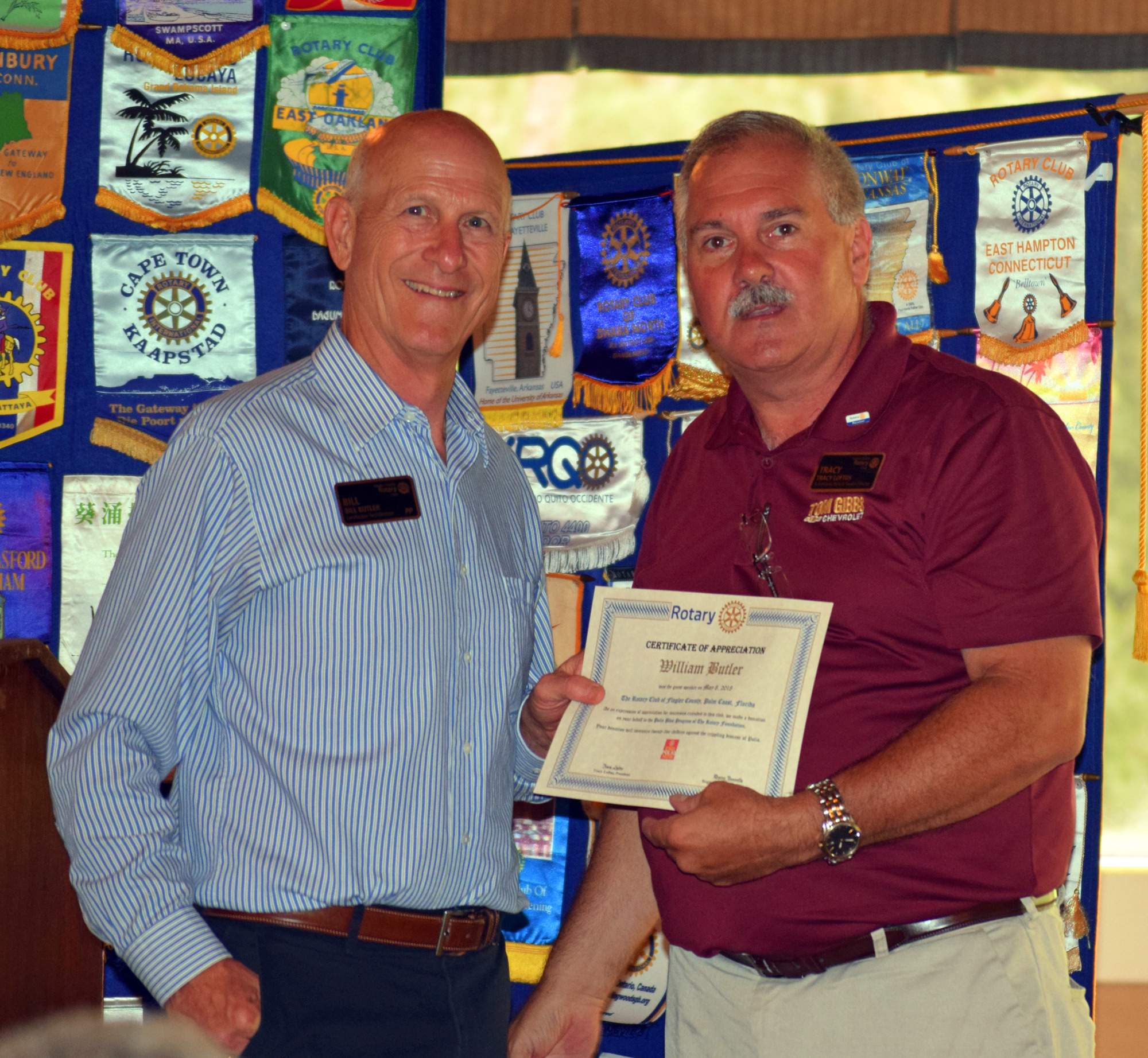 Bill Butler received the Flagler County Rotarian of the Year award, presented by then President Tracy Loftus. Photo courtesy of Marketing 2 Go