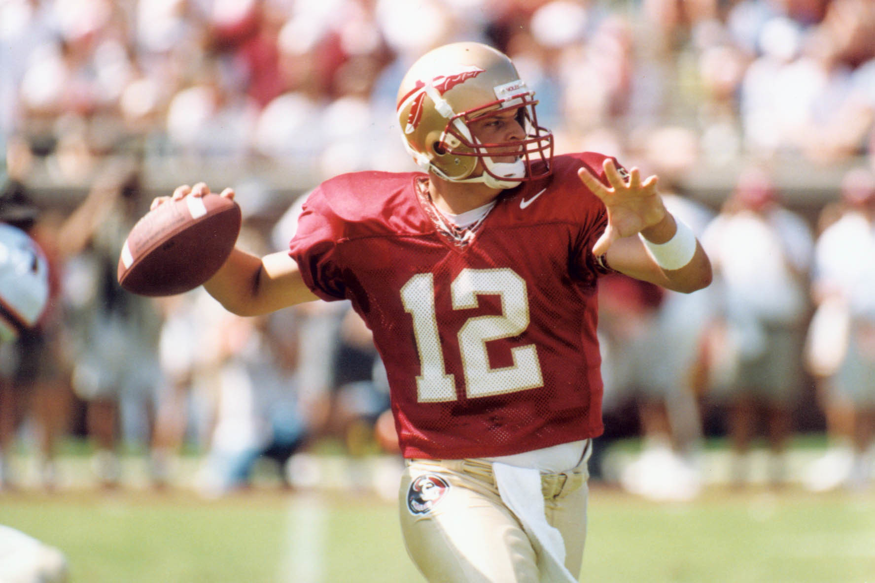 Former FSU quarterback Thad Busby drops back to pass during a game. Photo courtesy of FSU Sports Info