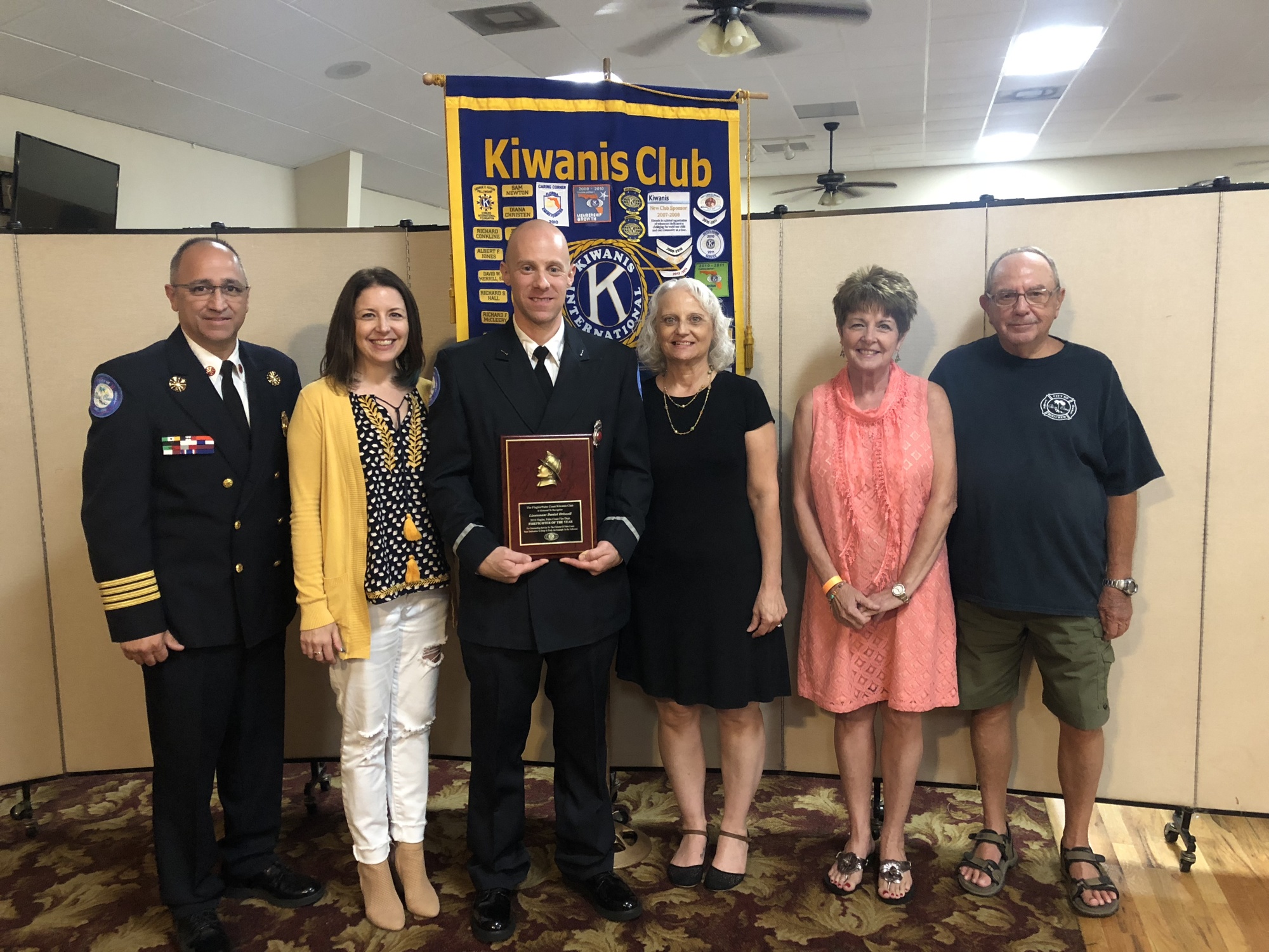 Palm Coast Fire Lt. Dan Driscoll was honored by the Flagler-Palm Coast Kiwanis Club. Pictured from left are Chief Jerry Forte, Amy Driscoll, Driscoll, Mary Driscoll, Cindy Ser and Bill Ser. Photo courtesy city of Palm Coast