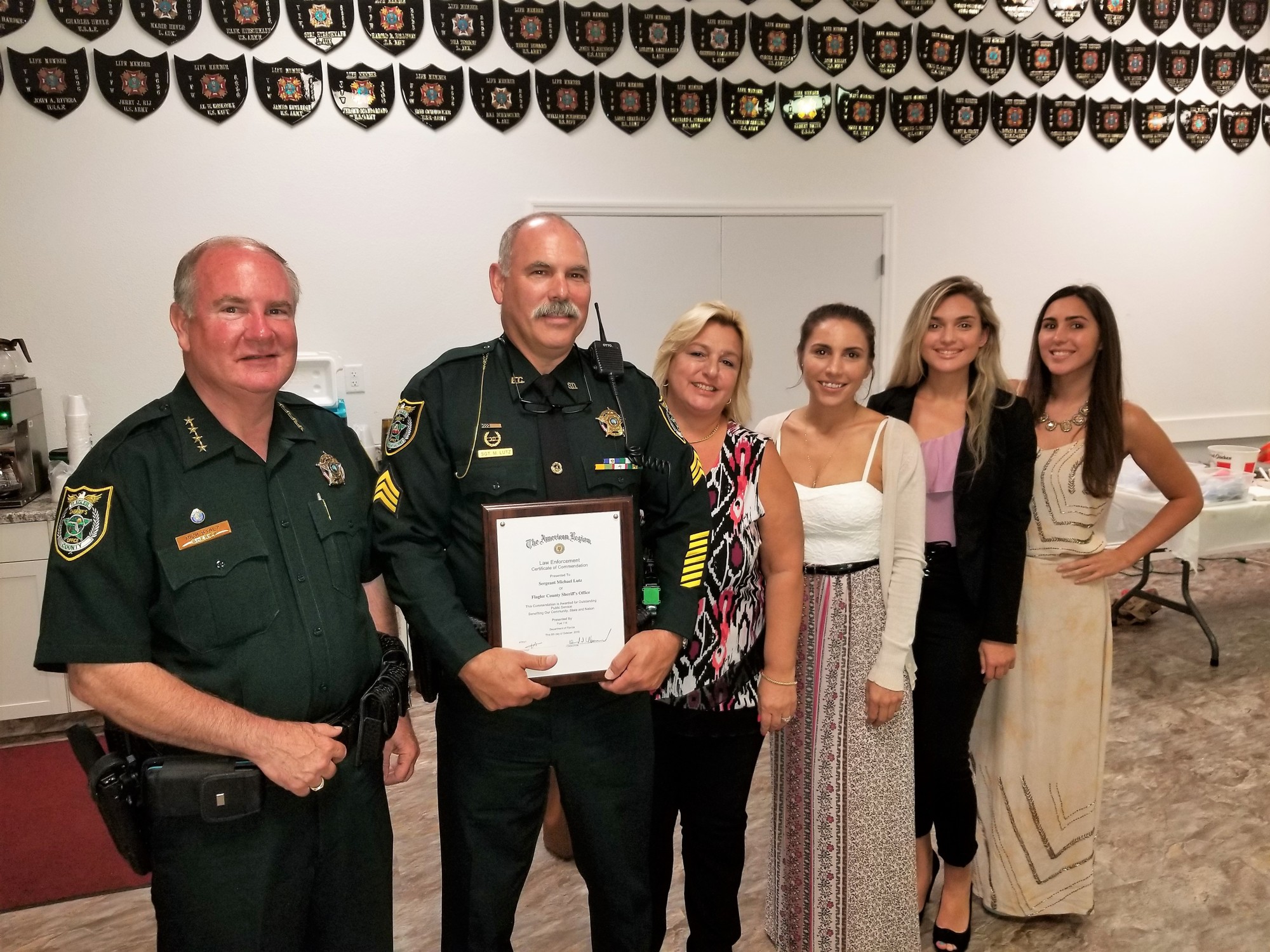 Flagler County Sheriff’s Office Sheriff Rick Staly presents Sergeant Mike Lutz with a Certificate of Commendation by the American Legion Post 115 for outstanding public service. Photo courtesy FCSO