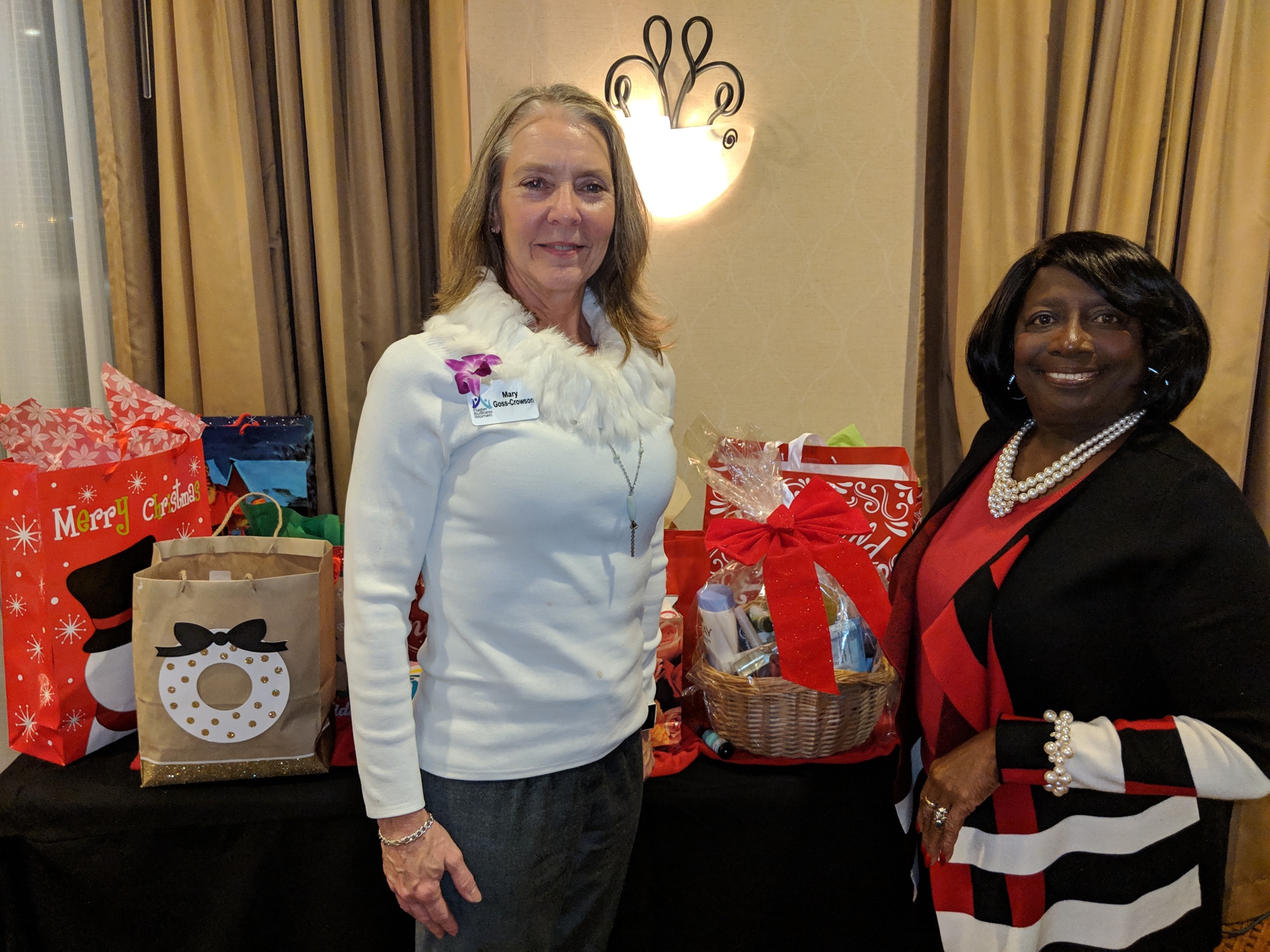 Flagler Business Women Outgoing President Agnes Lightfoot with President-Elect Mary Goss-Crowson at the December meeting. Photo courtesy of Mary Goss-Crowson
