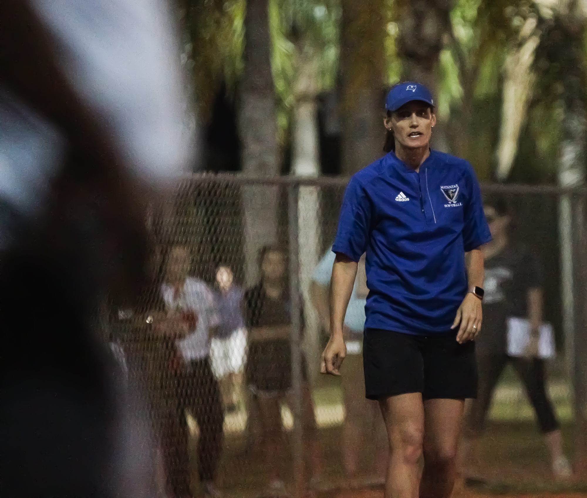 Matanzas softball coach Sabrina Manhart gives instructions to a Pirates batter during their season opener against Seabreeze. Photo by Ray Boone