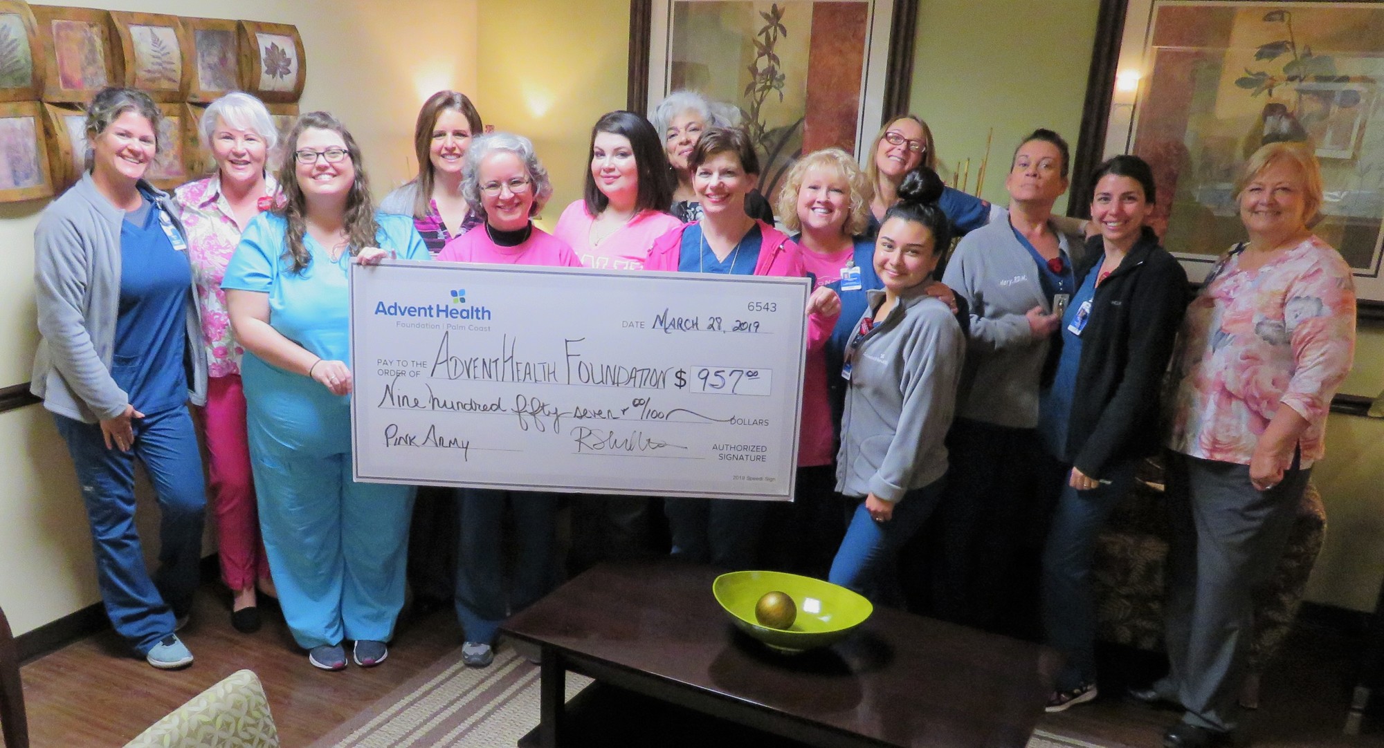 Staff from the AdventHealth Palm Coast imaging department donated nearly $1,000 to support the fight against breast cancer locally on March 27. Photo courtesy of AdventHealth