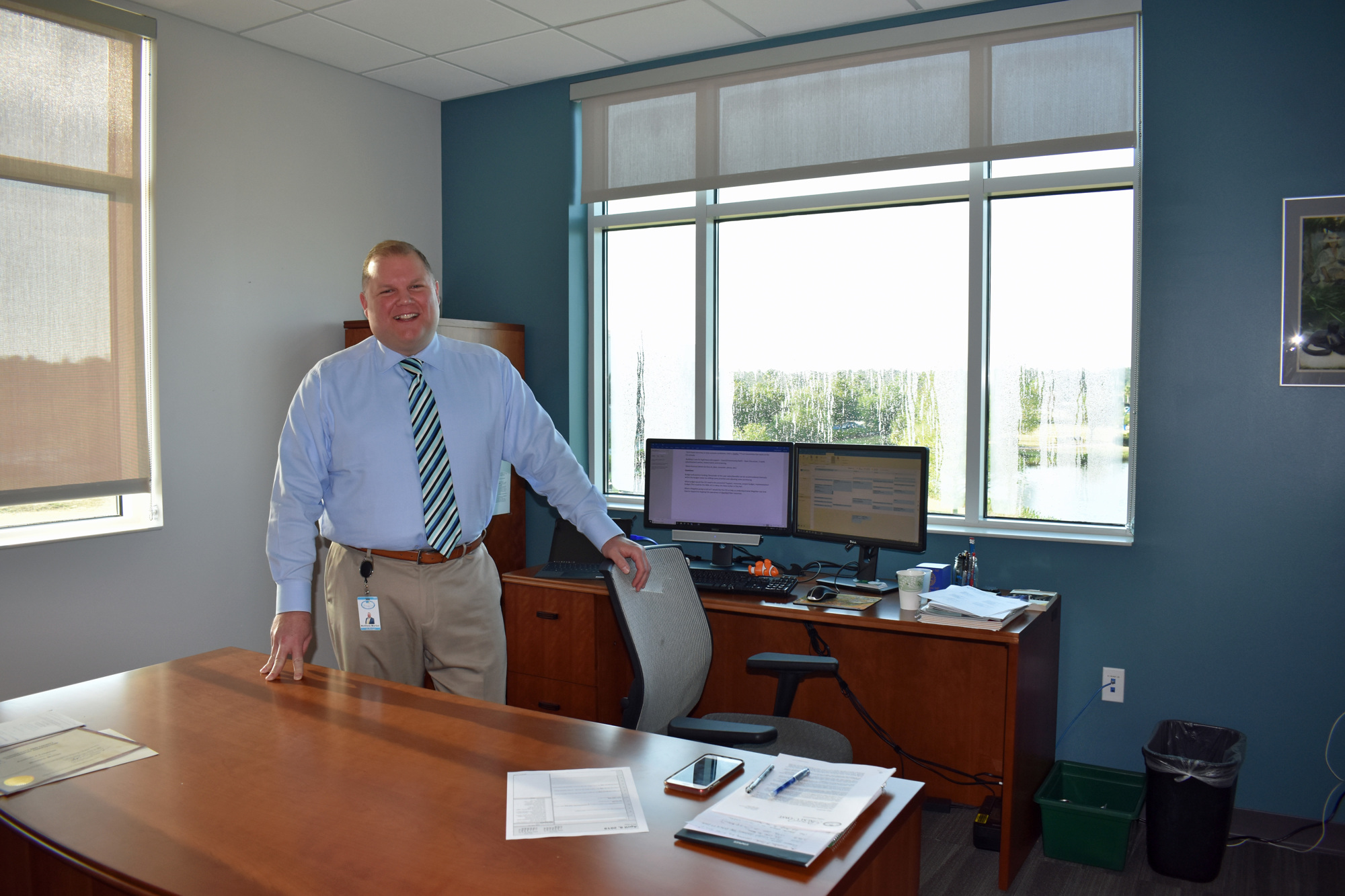 Matt Morton poses in his corner office at City Hall. Photo courtesy of the city of Palm Coast
