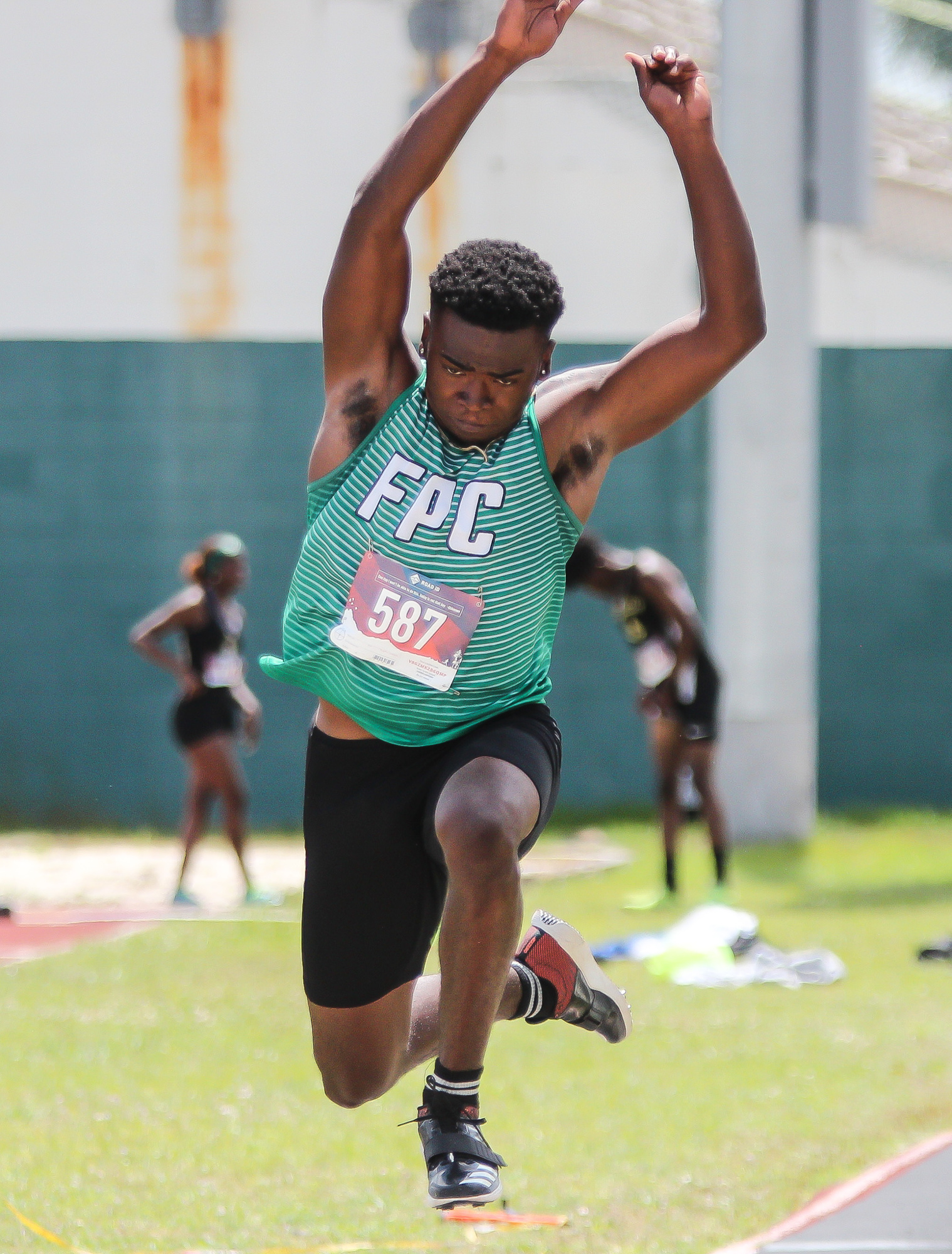 Curtis Gray competes in the triple jump at the district meet on April 9 at FPC High School. File photo