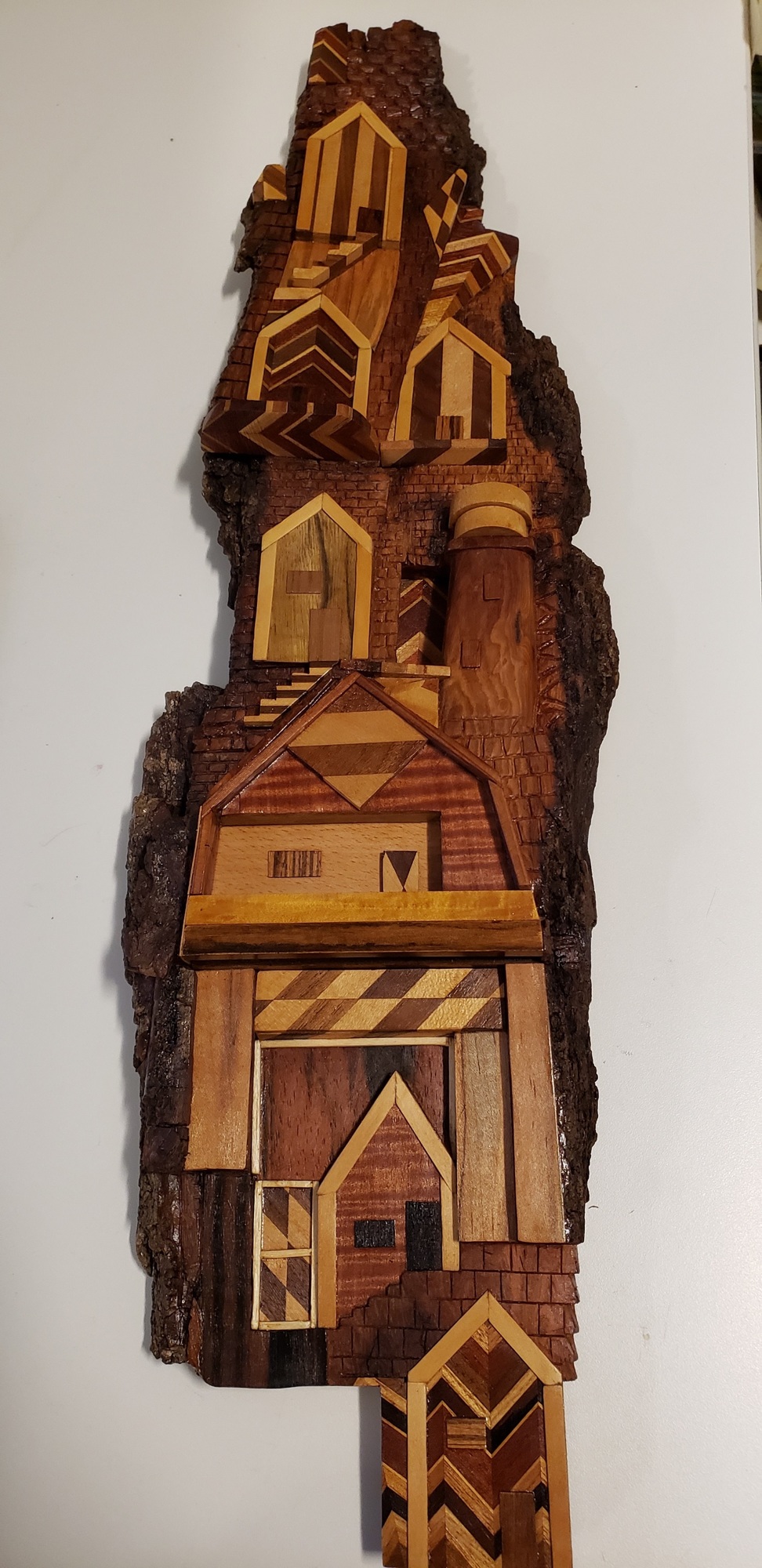 Wood carving art featuring lighthouses. Courtesy photo