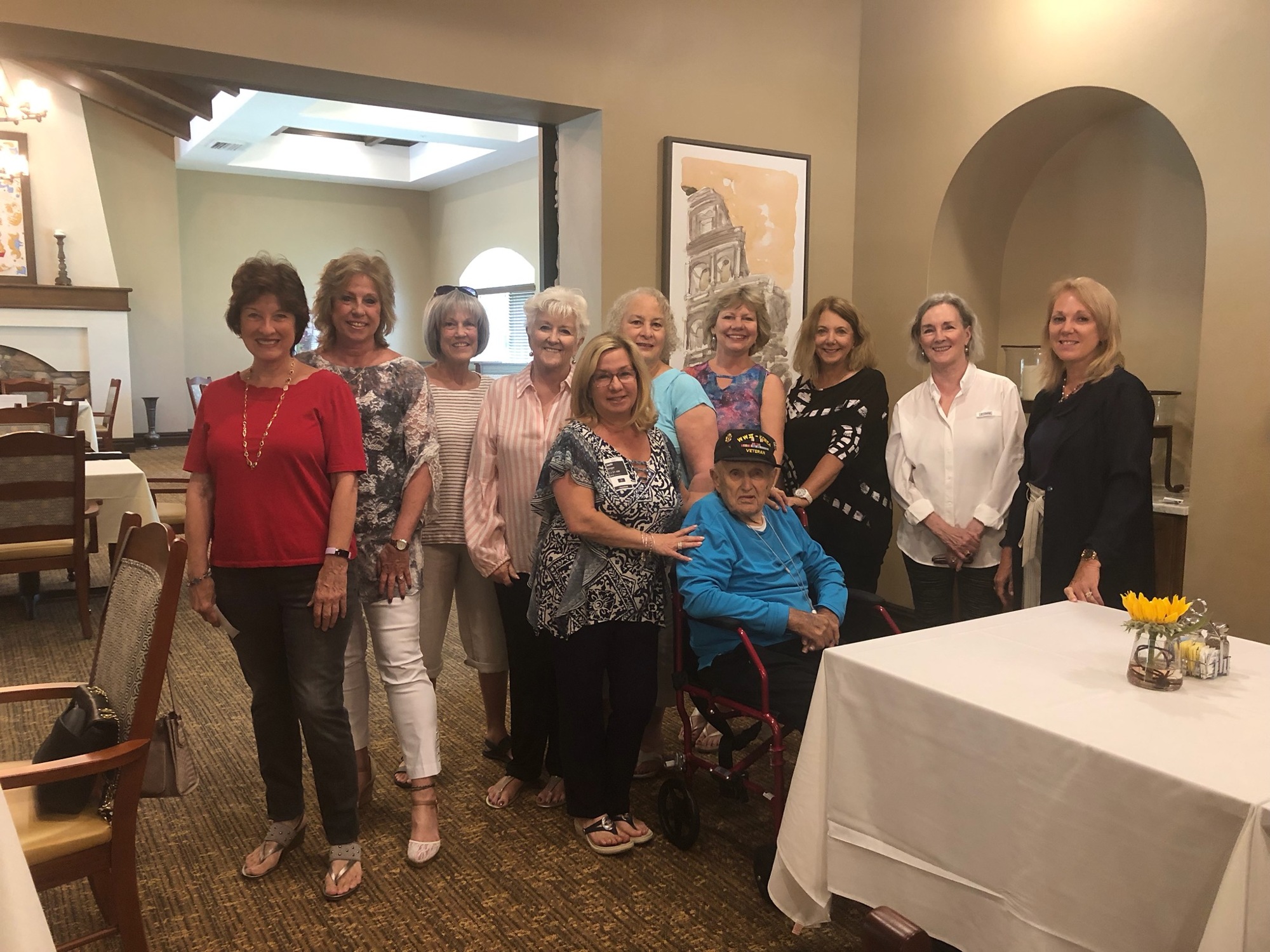 The Bookettes, a Grand Haven book club, visited veteran John Unger and presented him with a German chocolate birthday cake and card, which named him an honorary member of The Bookettes. Courtesy photo