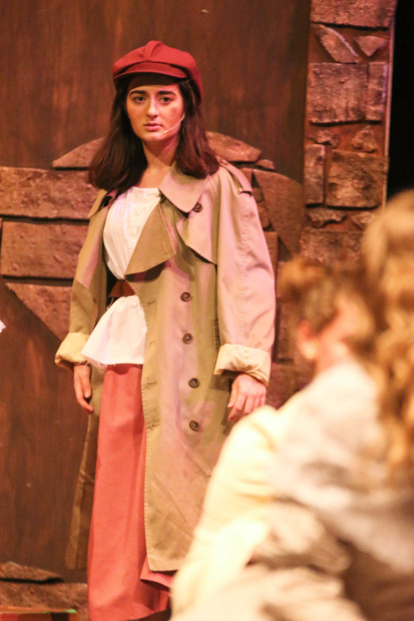 Elana Sobhani, as Eponine, watches Cosette and Marcus meet for the first time. Photo by Paige Wilson