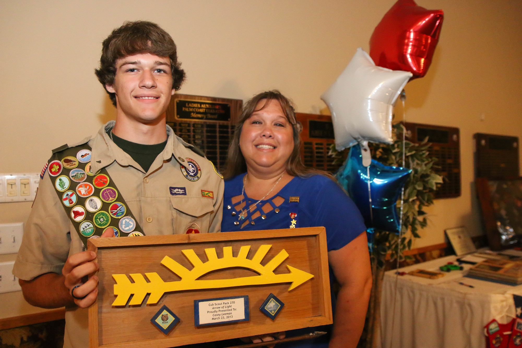 Casey Leeman stands with his mom, Lisa Leeman, at the Eagle Scout ceremony. Photo by Paige Wilson