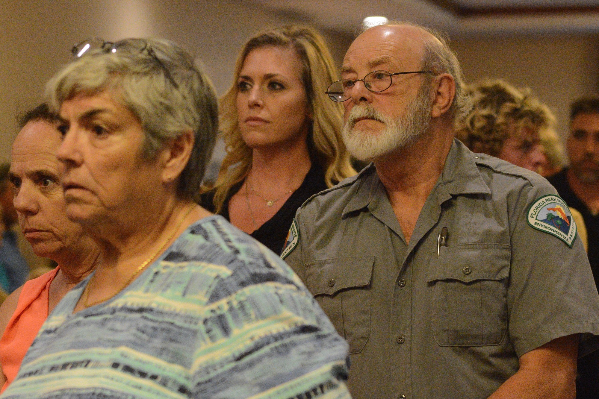 Residents stand in line to speak about the proposed development. (Photo by Jonathan Simmons.)