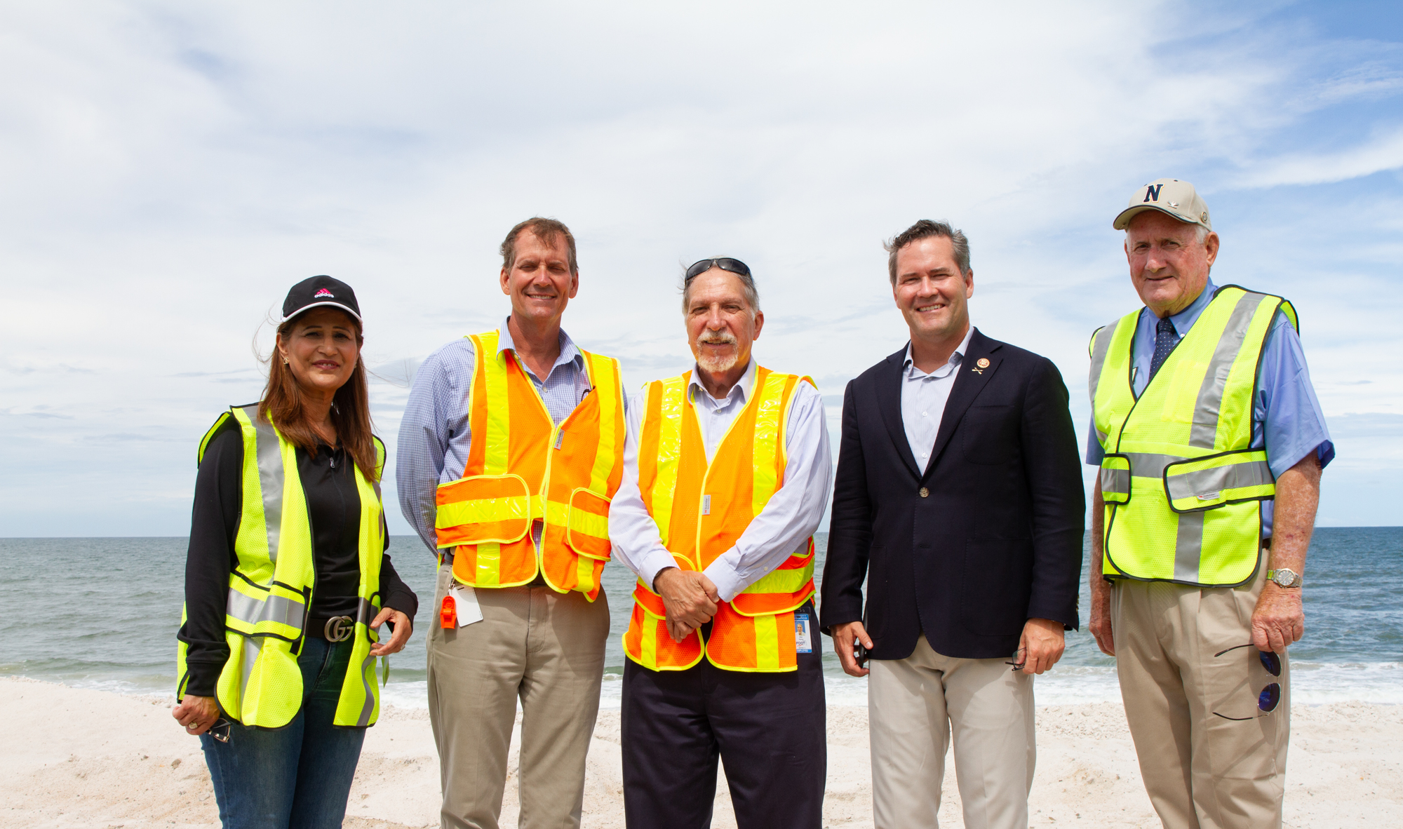 County Engineer Faith Alkhatib, Deland Operations Engineer Ron Meade, Director of transportation Operations Alan Hyman, Congressman Waltz, and county commissioner Dave Sullivan on north Flagler Beach.  Photo by Paola Rodriguez