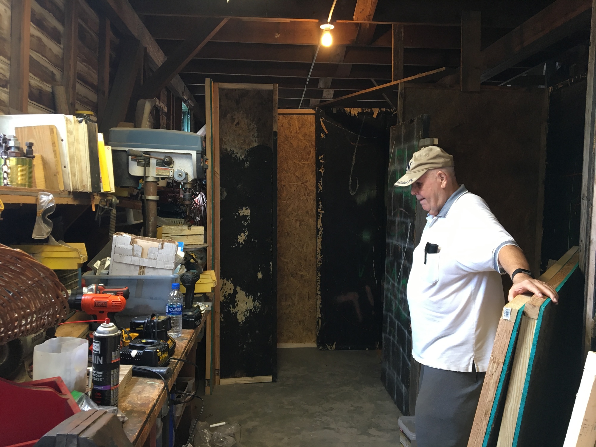 John Umpenhour surveys his tools in the barn. Photo by Joey Pellegrino