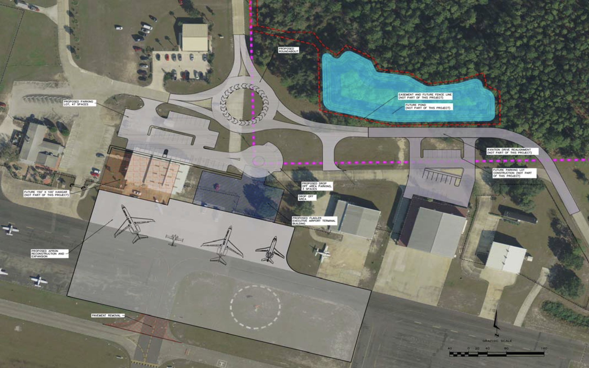 The roundabout, access road and some parking require use of land in the parcel. Its border is shown below with a pink dotted line.