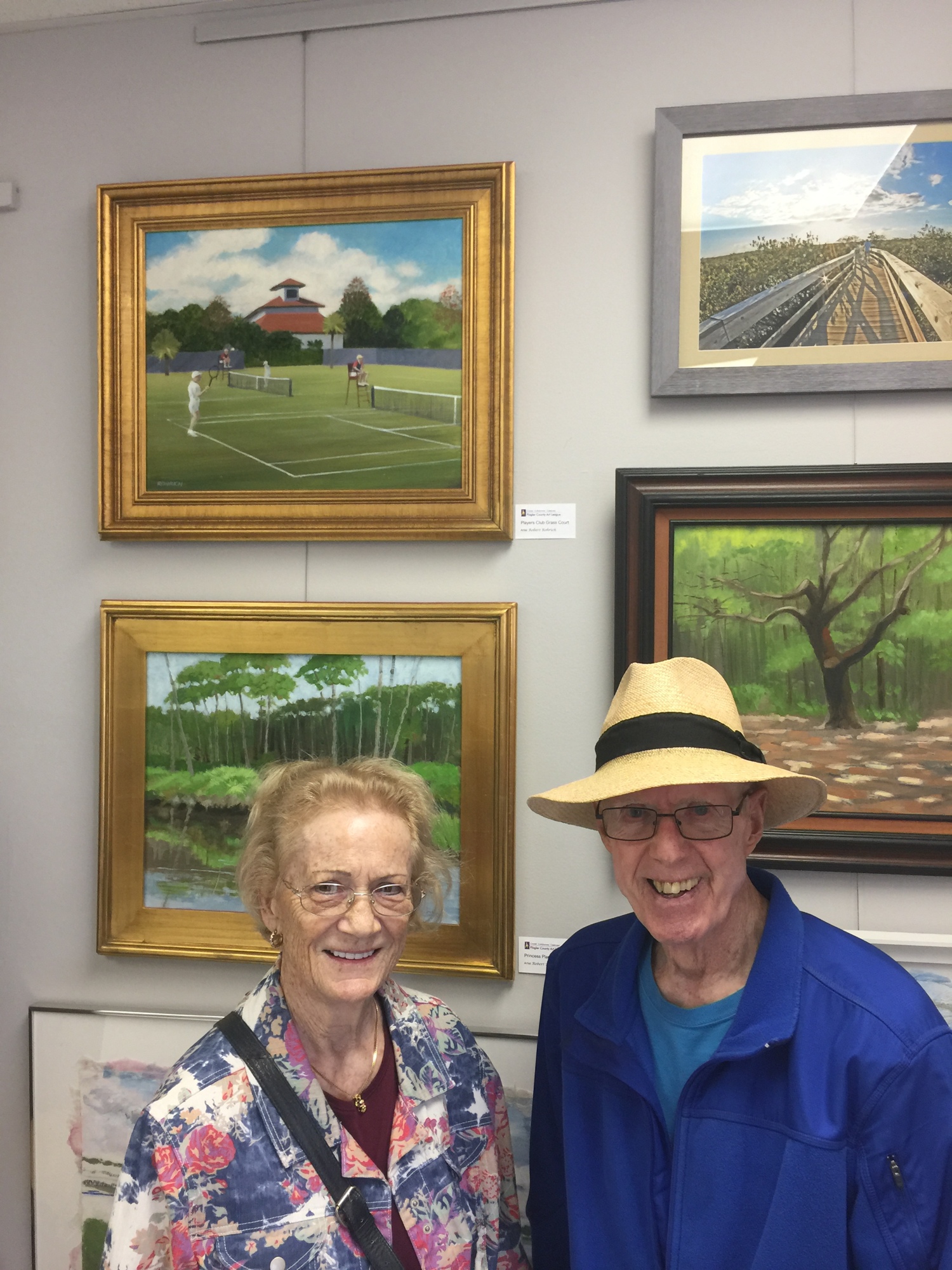 Robert and Christa Rohrich. Robert's paintings are scenes of Palm Coast. Courtesy of the PCHS
