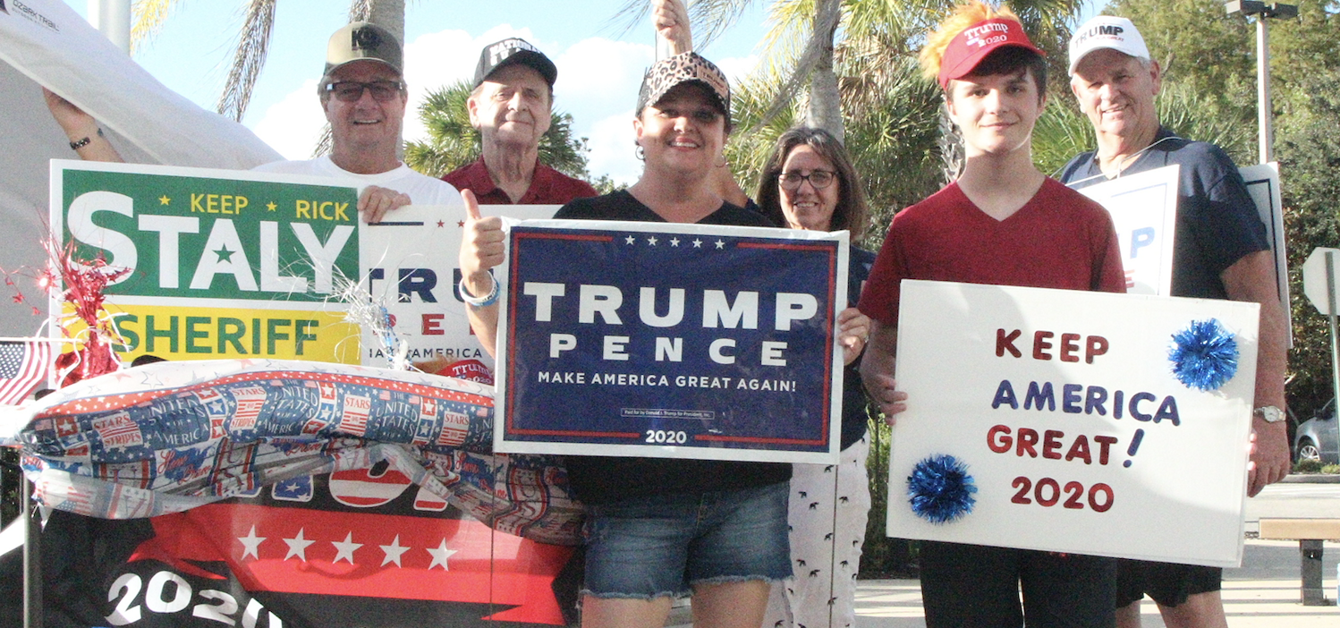 Trump supporters at the county Government Services Building during early voting. Photo by Jonathan Simmons