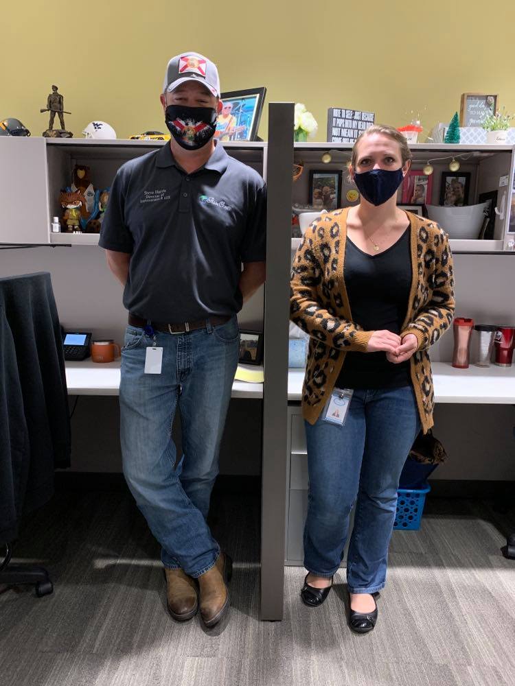 Steve Harris, director of implementation and architecture, and Alyssa Roscoe, customer service specialist.  Photo by Brian McMillan