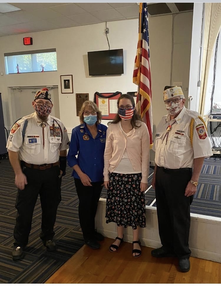 Left to right: Sr Vice Commander Ron Starke Auxiliary President Shirley Cortese Winner Faith Hannah Lea VOD Chairman Pat Donnelly