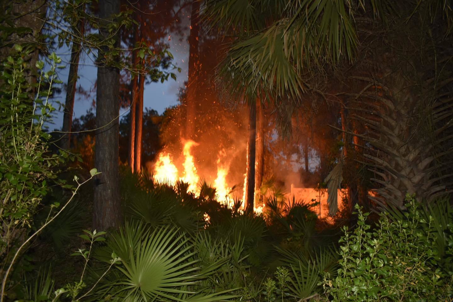The flames burned close to one home's fence. Photo courtesy of the city of Palm Coast