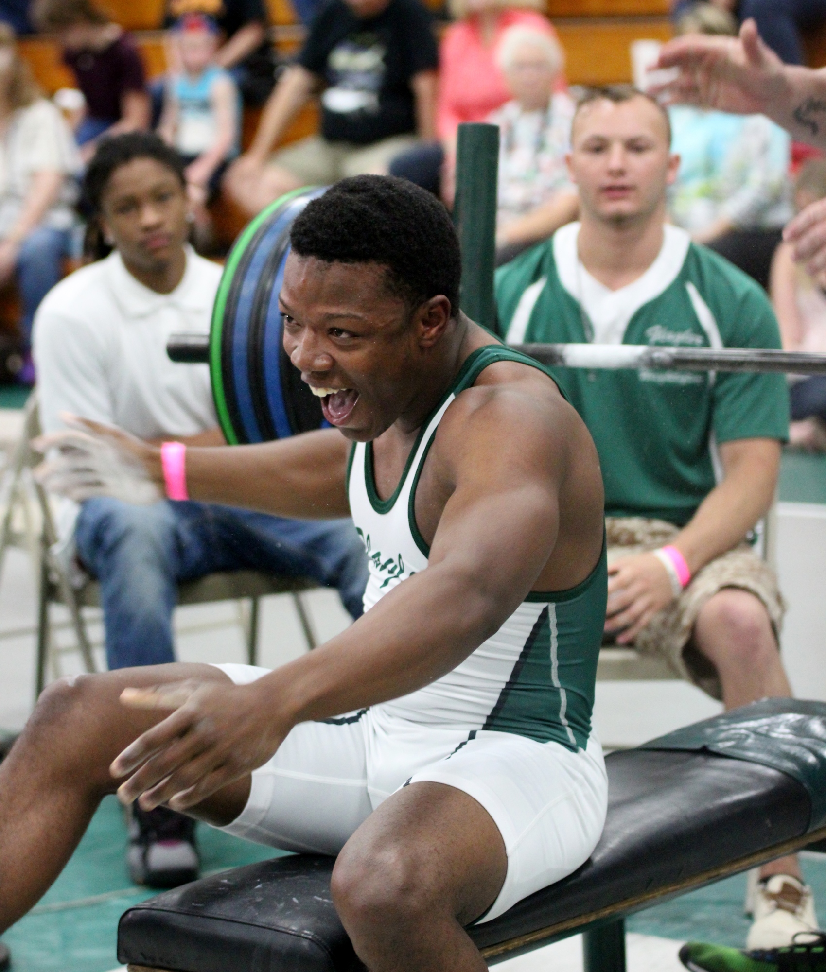 Donte Bell expresses his joy after clearing 300 pounds on the bench. Jeff Dawsey