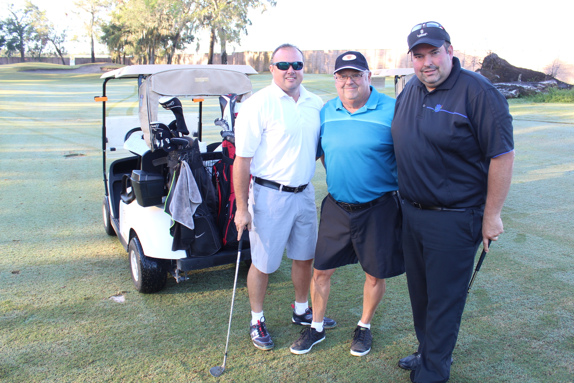 Rick, Paul and Thomas Elkin during OBPAL's 20th annual golf tournament in 2017. File photo