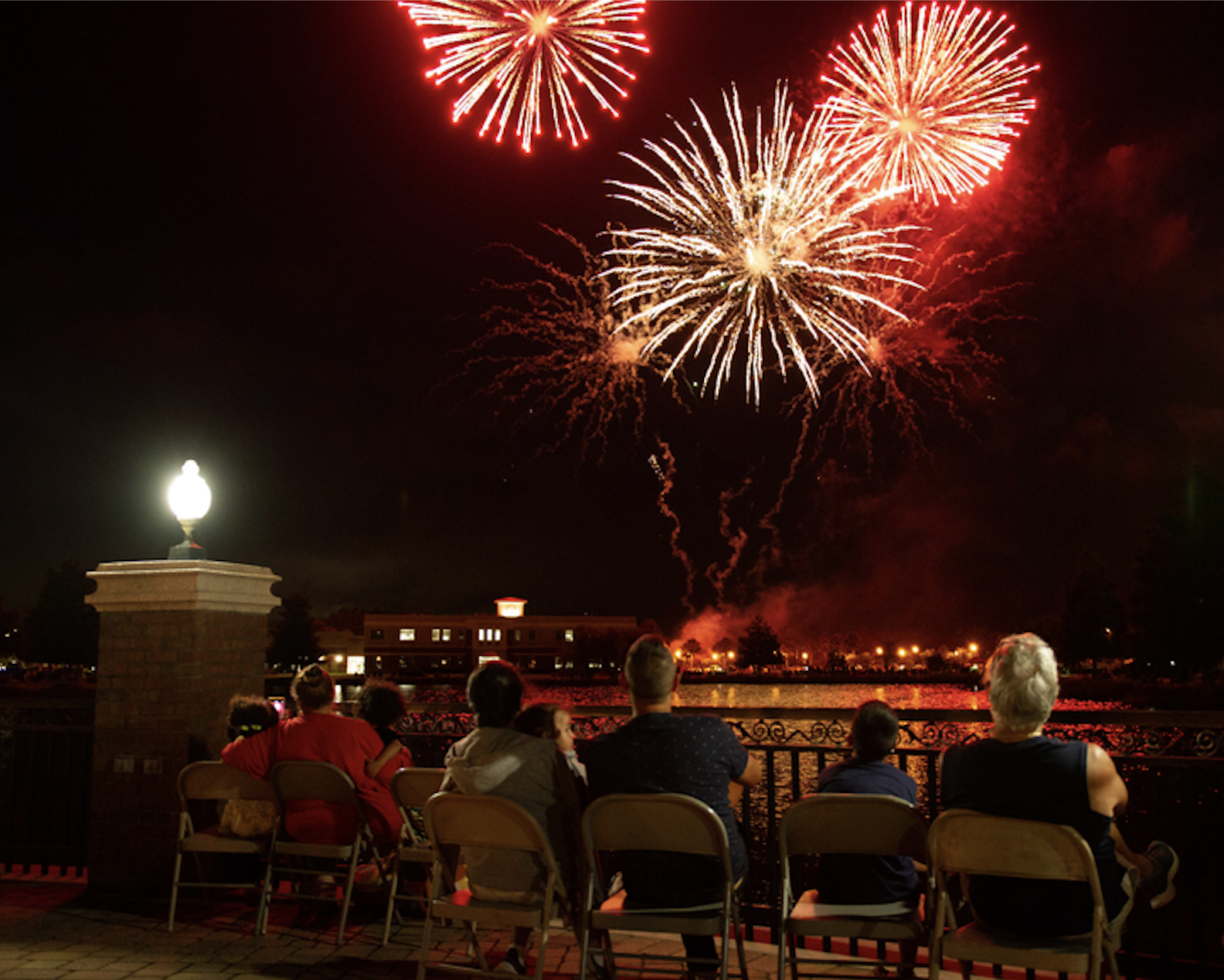 Locals watch a fireworks show at Palm Coast's Town Center. File photo by Jake Montgomery