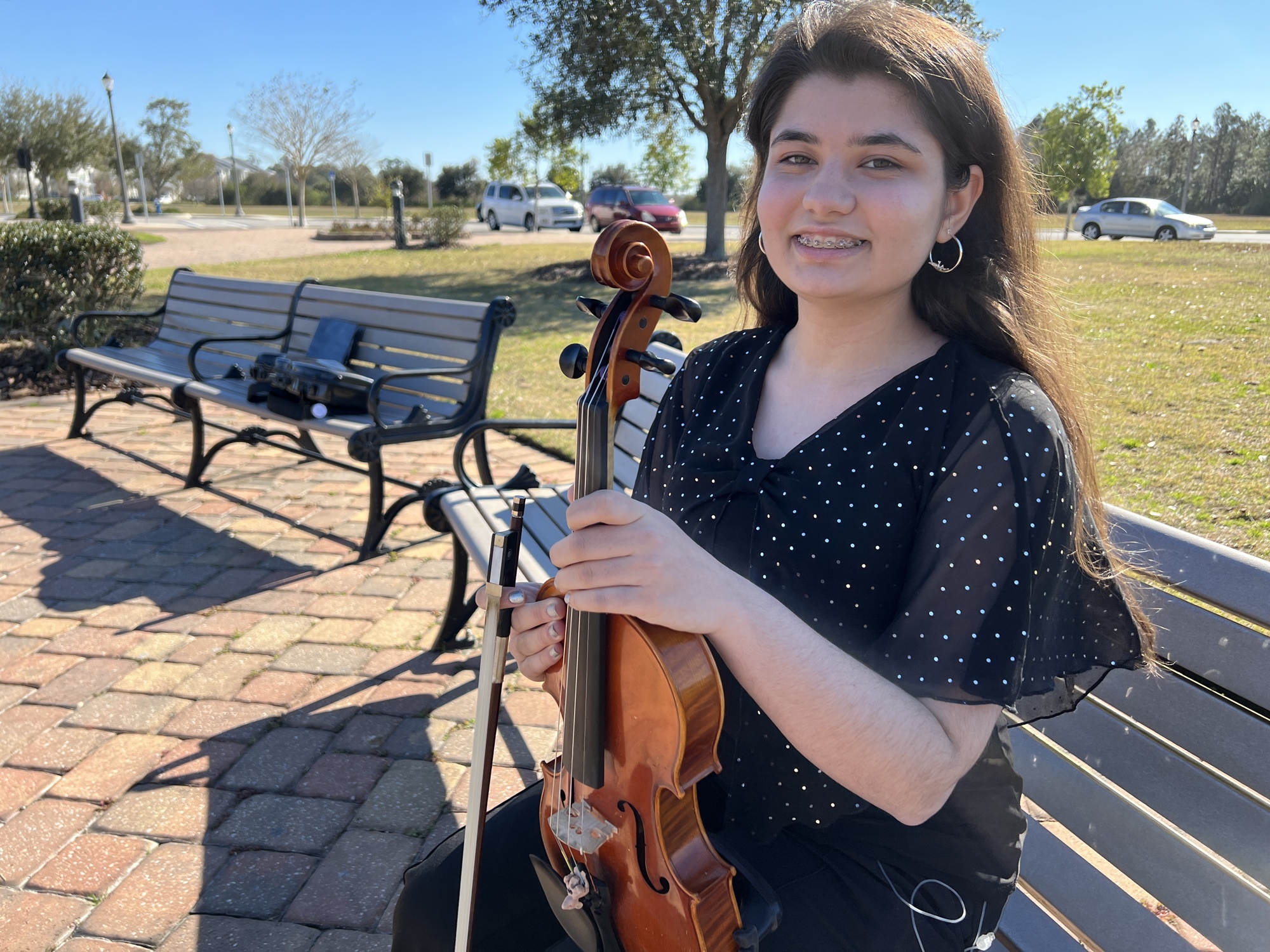 Hannah Lopez, 17, has played violin for the past nine years. Some days, she plays for three or four hours at a time; other days, she steals five minutes here and there. Photo by Brian McMillan