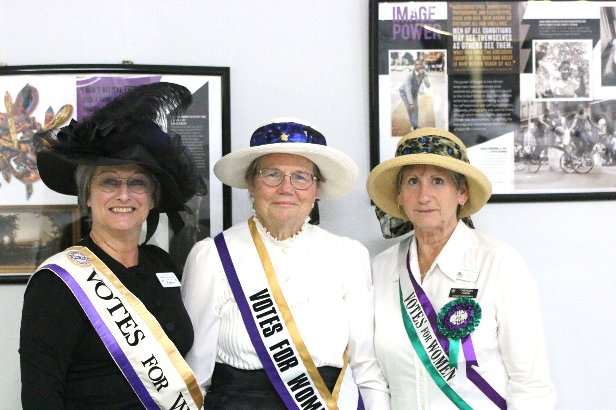 Suffragette re-enactors Kathy Reichard-Ellavsky, Gail Palmer and Theresa Owen. Photo by Brent Woronoff
