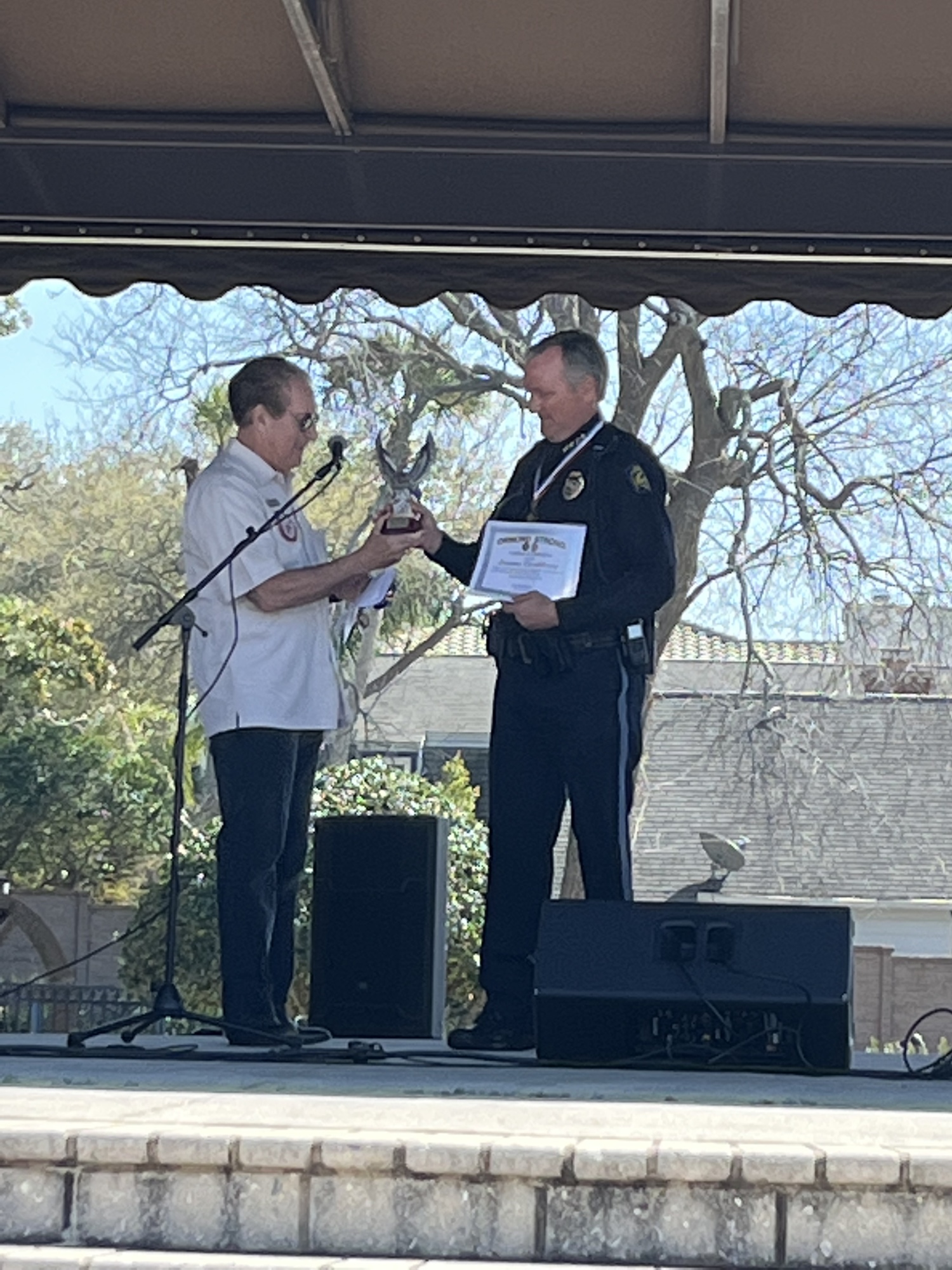 Sen. Tom Wright awards Ormond Beach Police Chief Jesse Godfrey with a J.J. Martin Leadership award. Photo courtesy of the city of Ormond Beach