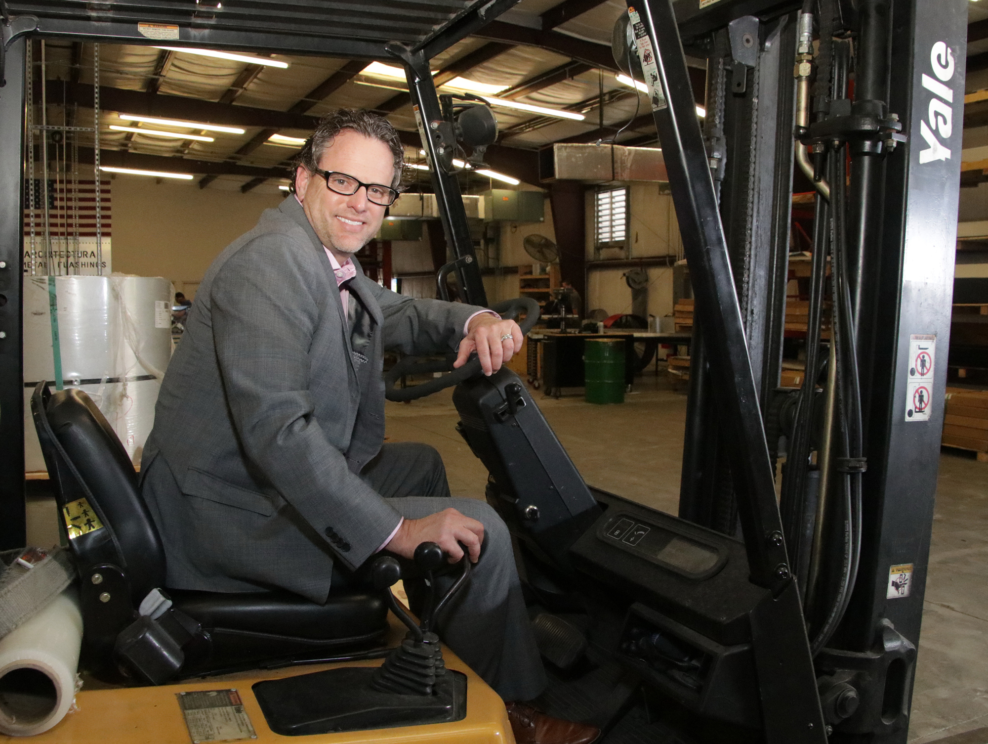 Jeff Bonk not only runs the company, he's also known to run the forklift when his fabricators are too busy to retrieve materials.