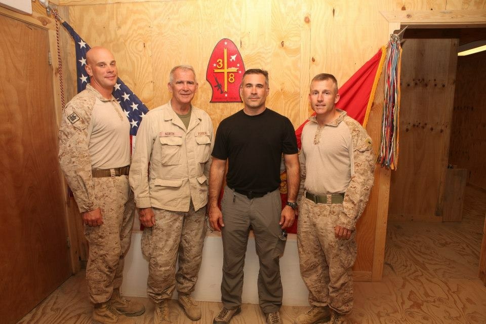 Retired U.S. Marine Corps Sgt. Major Matt Putnam, left, with retired Marine Corps Lt. Col. Oliver North, while on tour in Afghanistan in 2014.