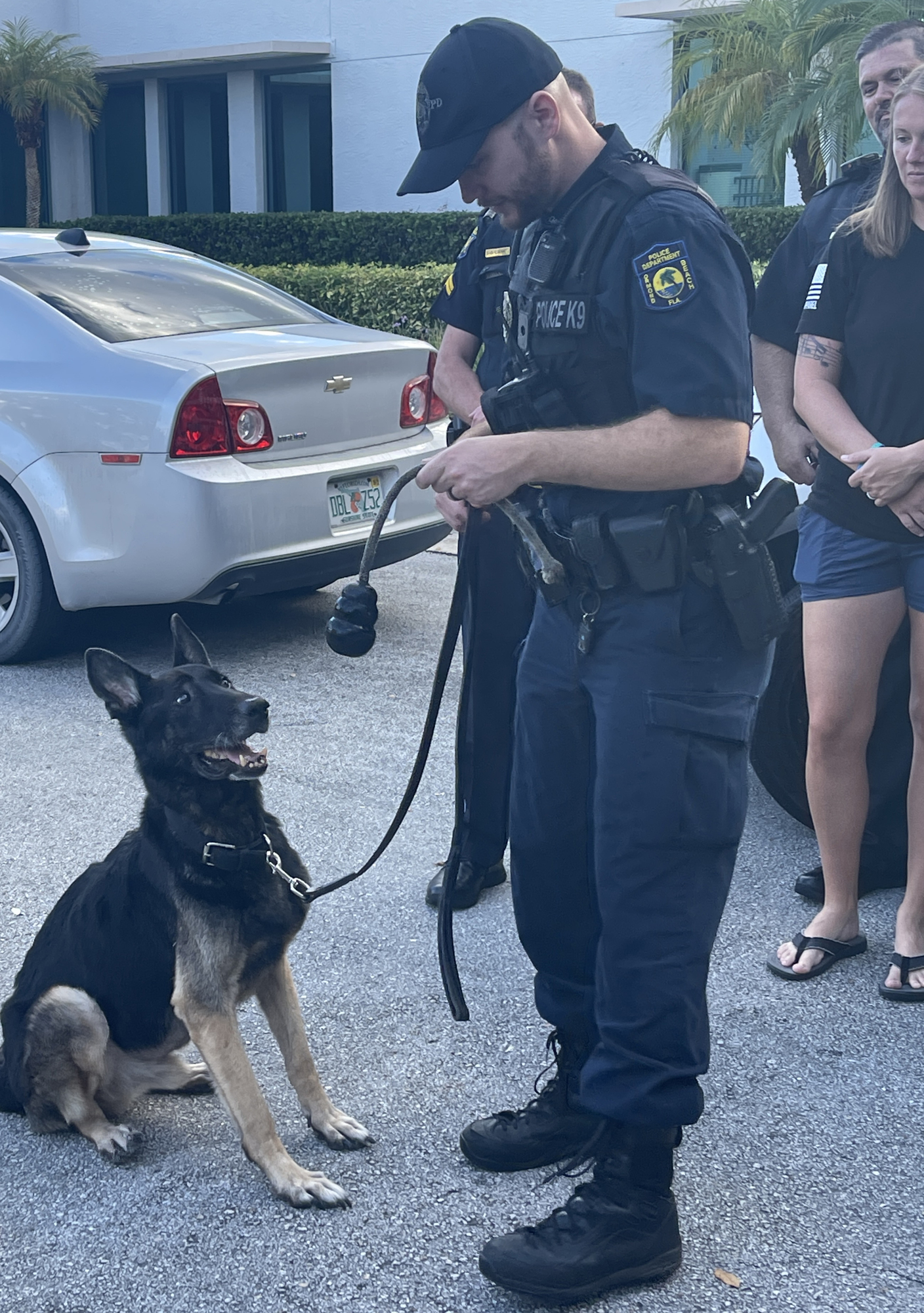 Ormond Beach Police K-9 Officer Justin Hyatt presents Kane with his toy. Courtesy of the city of Ormond Beach