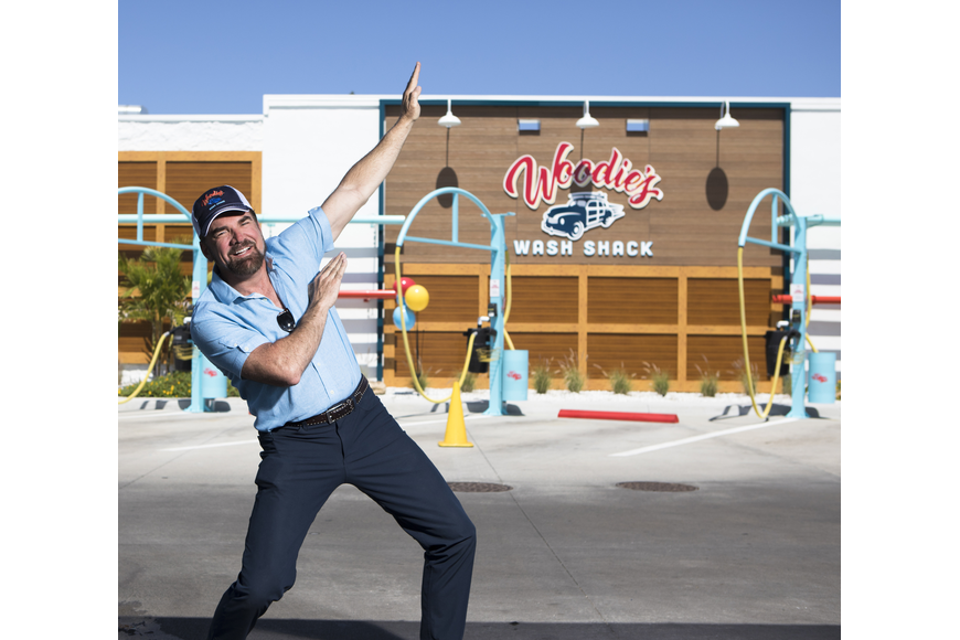 File. Don Phillips, managing director and co-owner of Woodie's Wash Shack, at the company's original location in St. Petersburg.