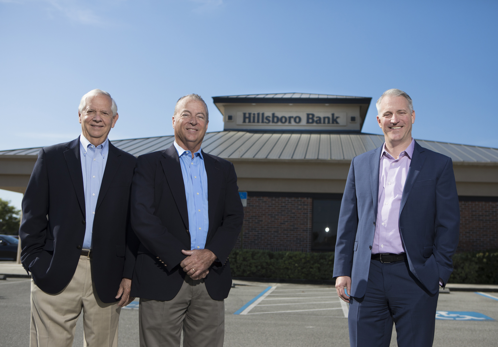 Wemple. Bank of Tampa's Bill West, far left, and Corey Neil, right, struck a deal with Mike Ward, center, to merge with Hillsboro Bank last year. It was the Bank of Tampa's first acquisition.