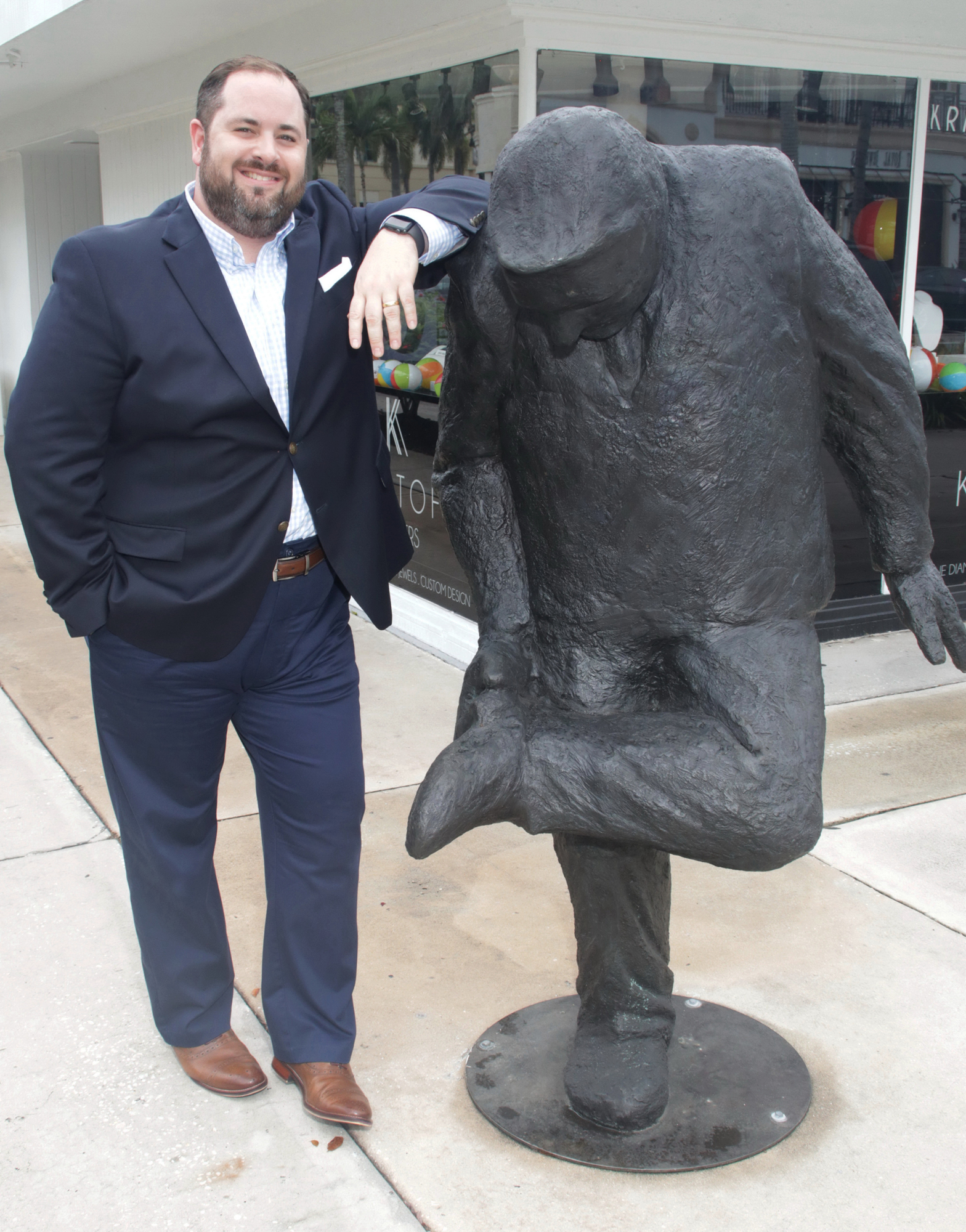 Bruce Barone with one of the many sculptures along Fifth Avenue South. JimJett.com photo