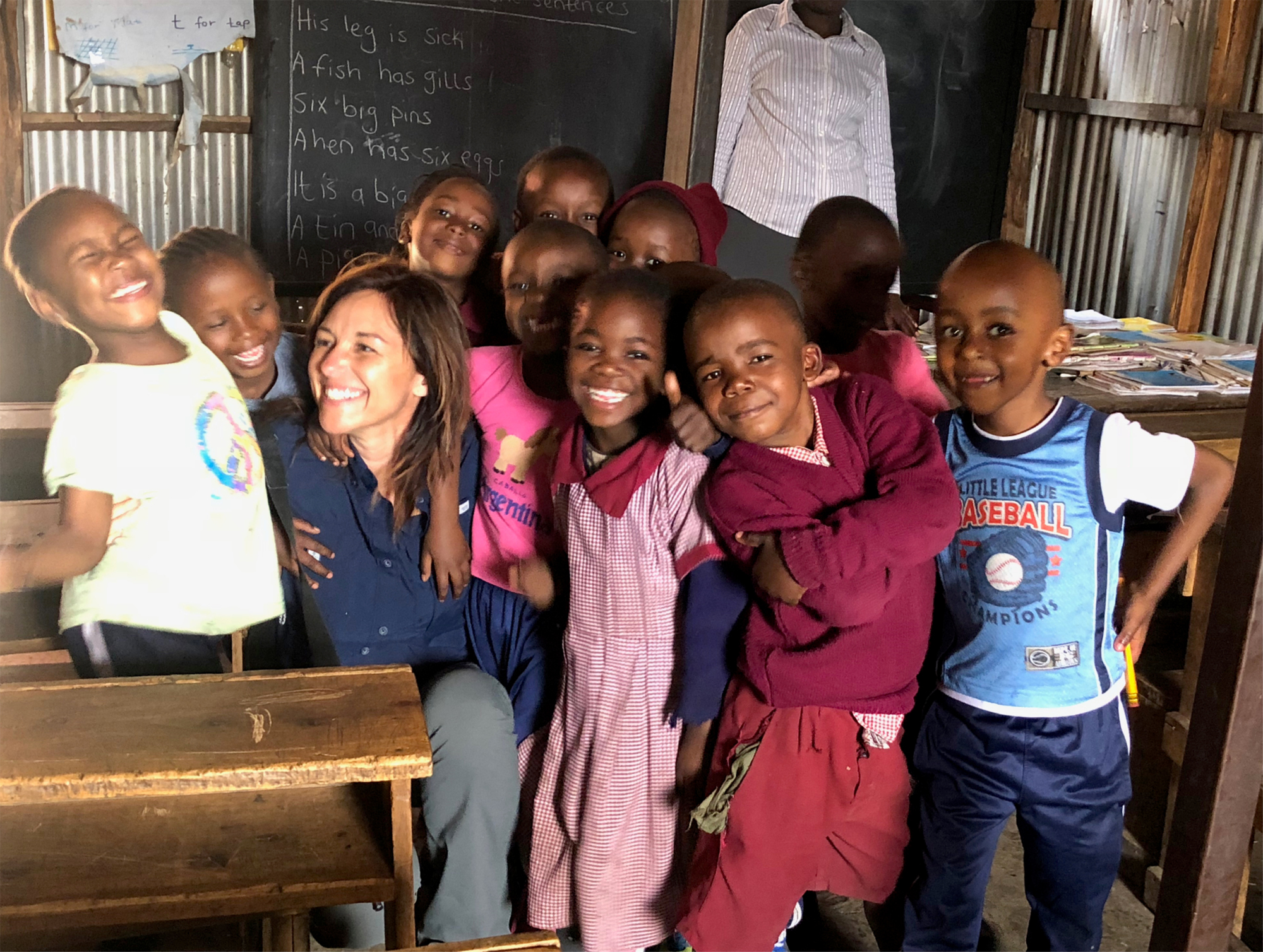 Alice Skaff visits with children in an orphanage in Kibera, a slum of Nairobi, Kenya, in prior to her climb of Mt. Kilimanjaro. Courtesy Alice Skaff