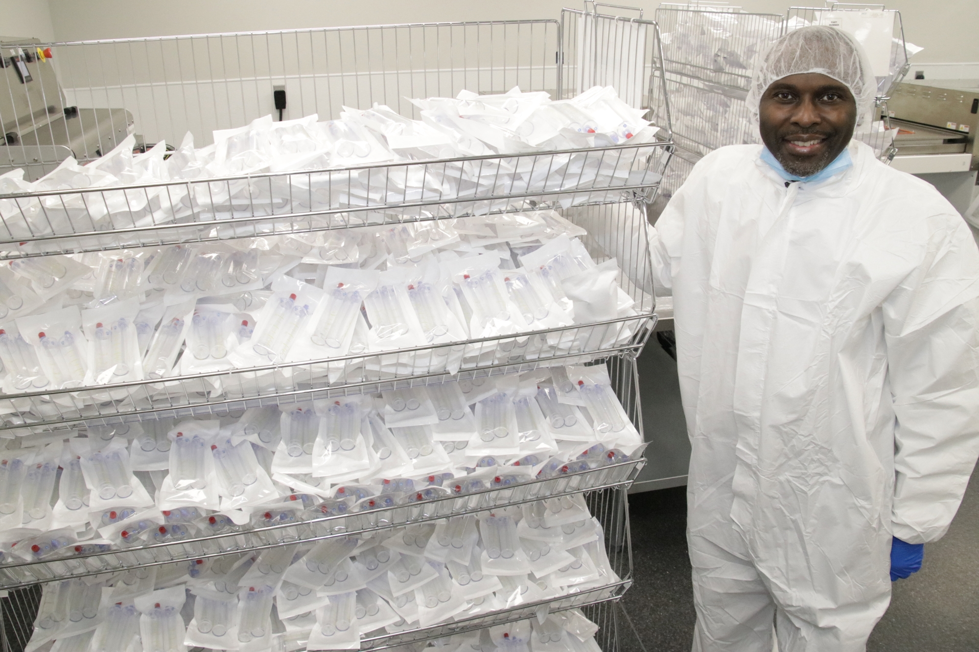 Emcyte Chairman and CEO Patrick Pennie in the clean room some some of the thousands of PRP treatment kits the company manufactures daily. Photo by JimJett.com
