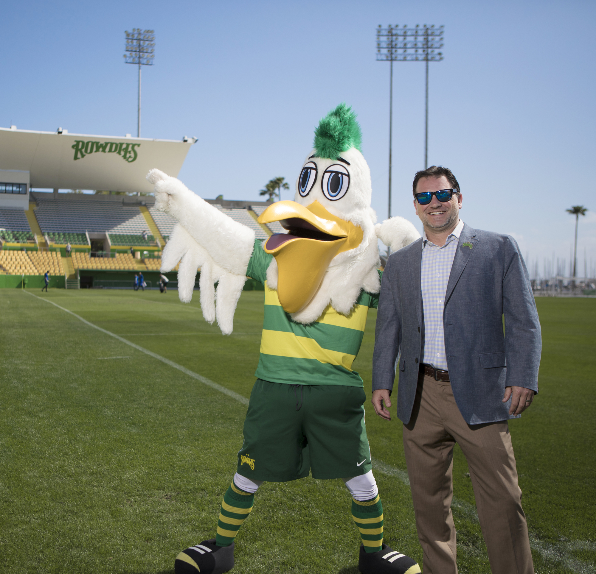 Mark Wemple. Tampa Bay Rays President Brian Auld with Tampa Bay Rowdies mascot Pelican Pete. 